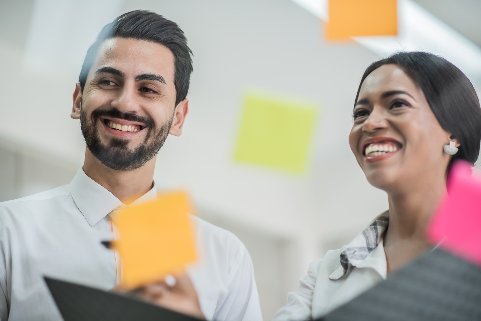 business people use post it for idea analysis and planning marketing,goal to success