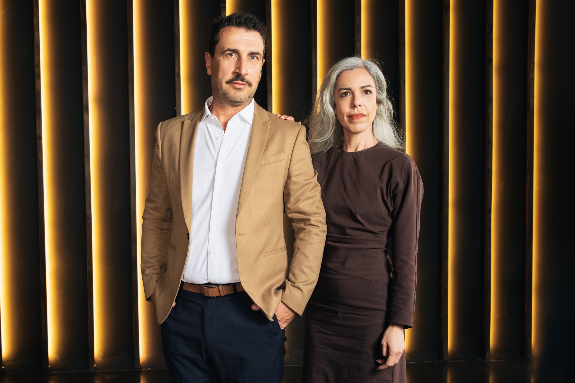 Business professionals showcasing corporate leadership in modern office setting