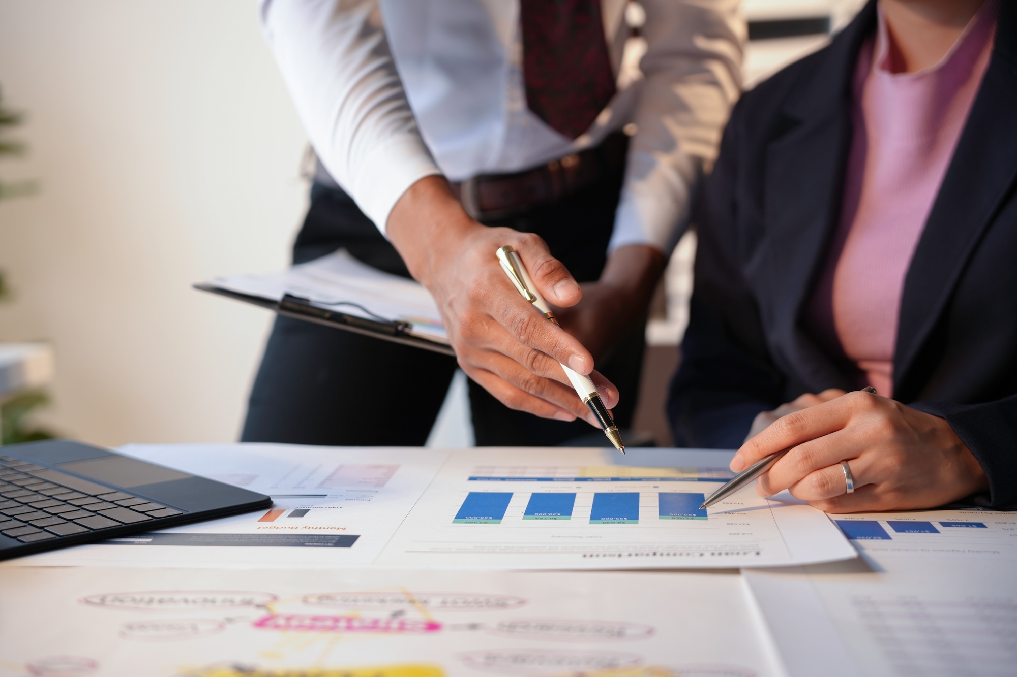 Business team analyzing financial data and developing growth strategy