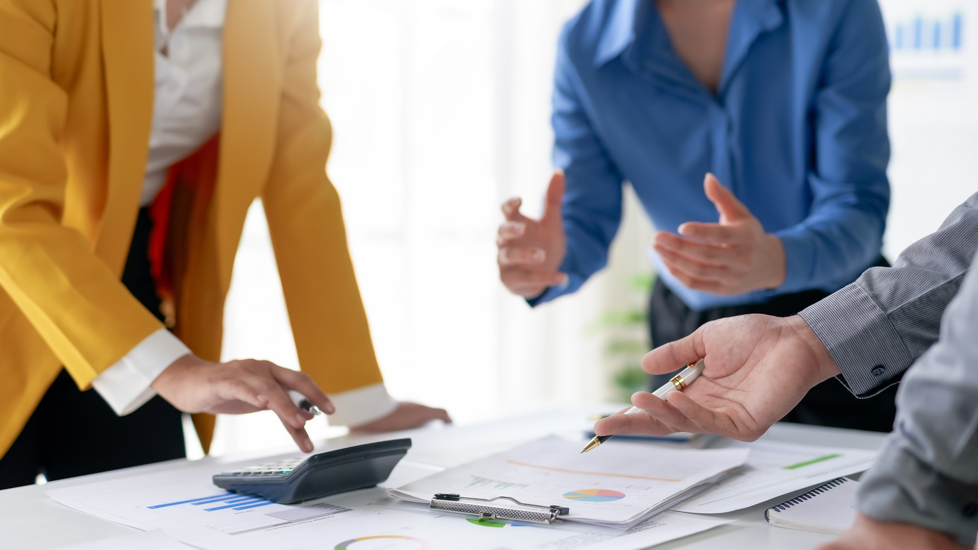 Business team discussing financial report.