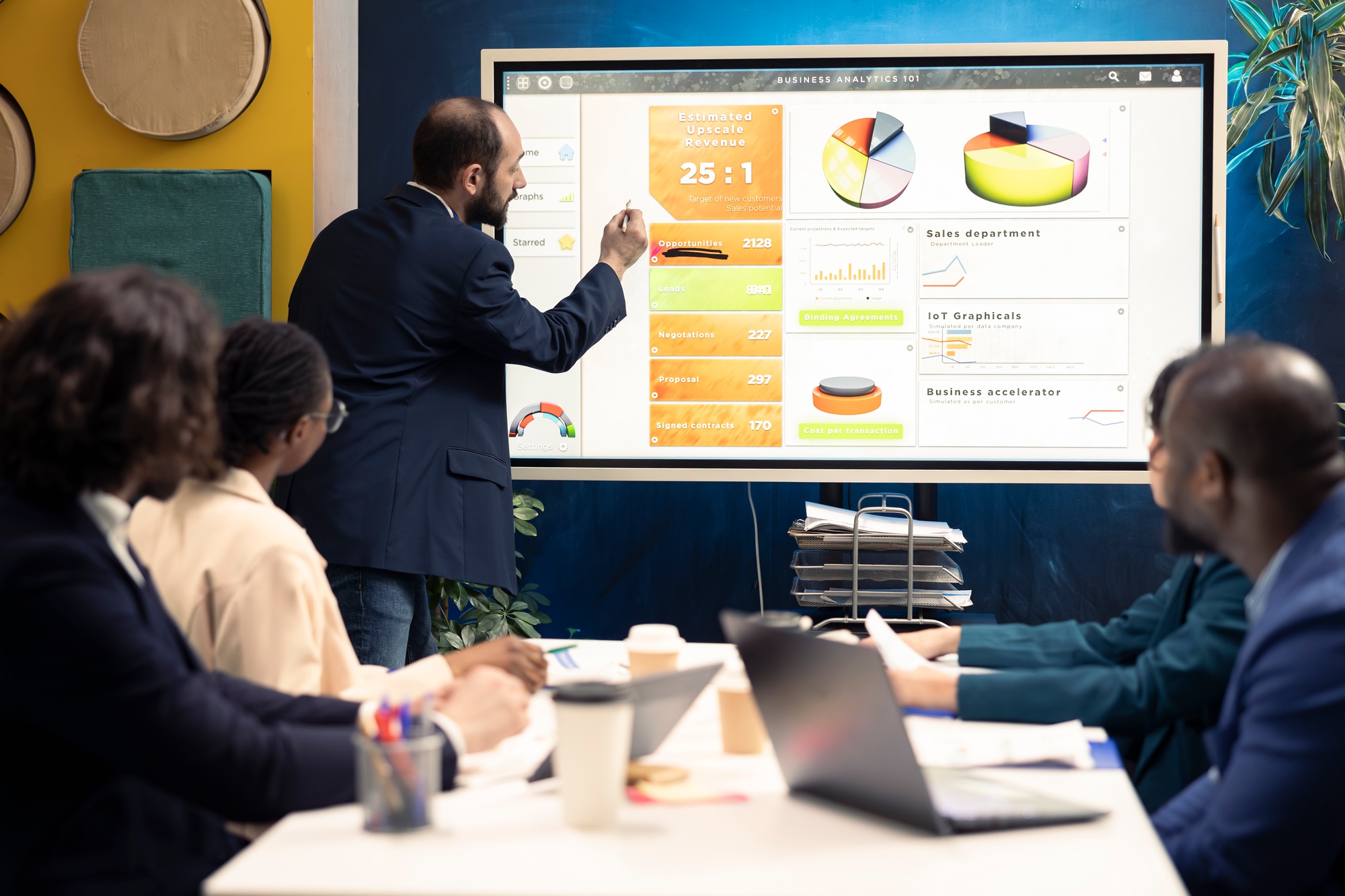 Business team looking into statistics and reports to detect any obstacles