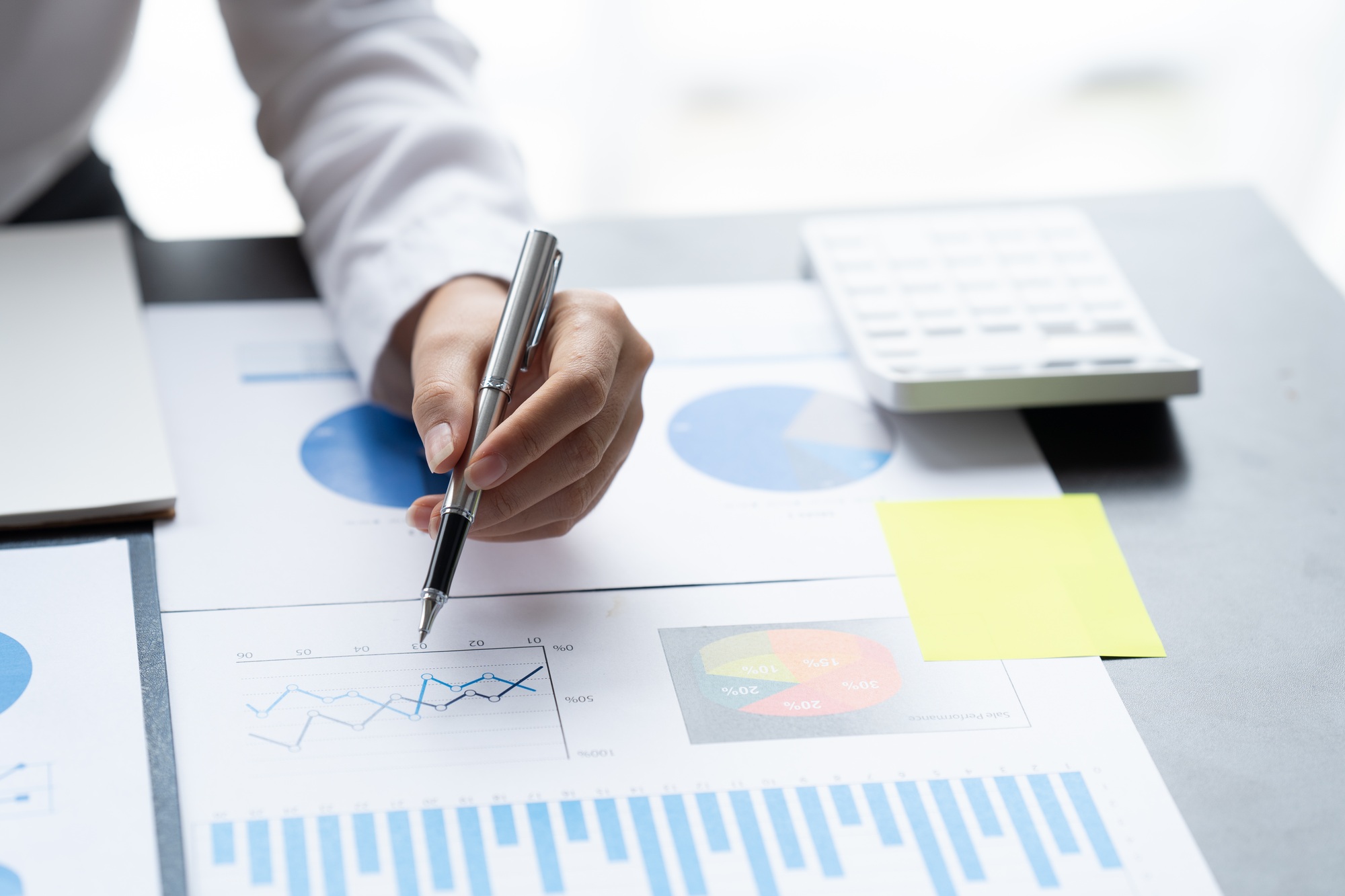 Businessman Accounting Calculating Cost Economic Financial data.