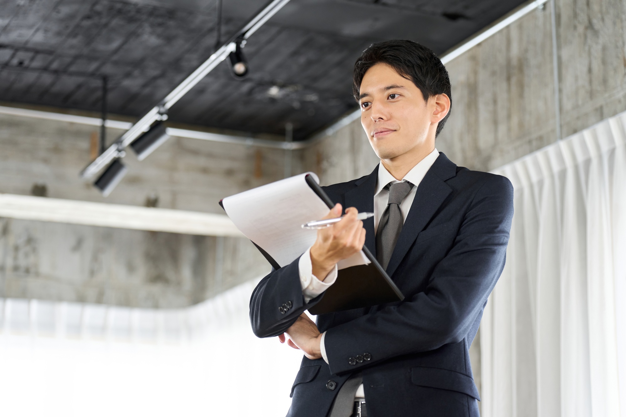 Businessman collecting information through questionnaires