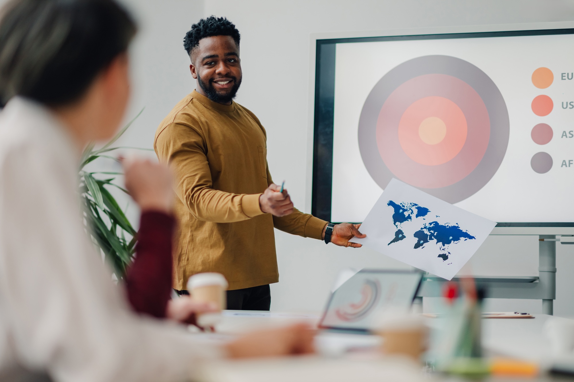 Businessman presenting global market data analysis