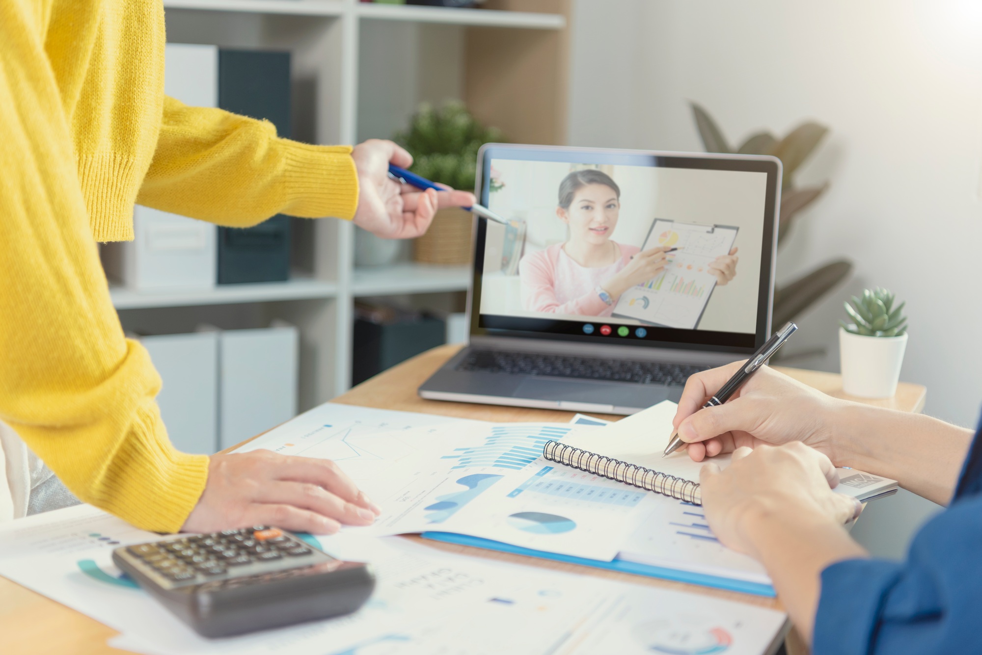 Businesspeople virtual video conference meeting plan analysis graph company