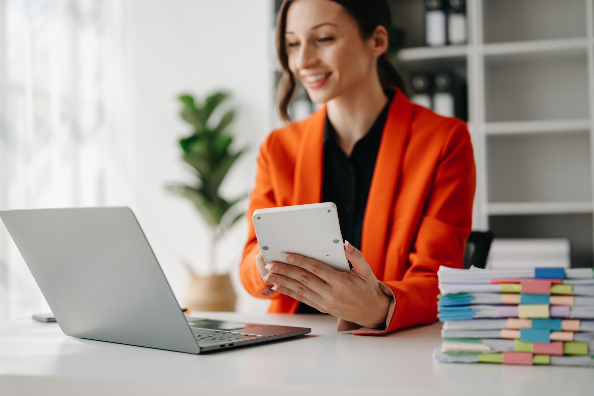 businesswoman or accountant hand typing laptop working to calculate