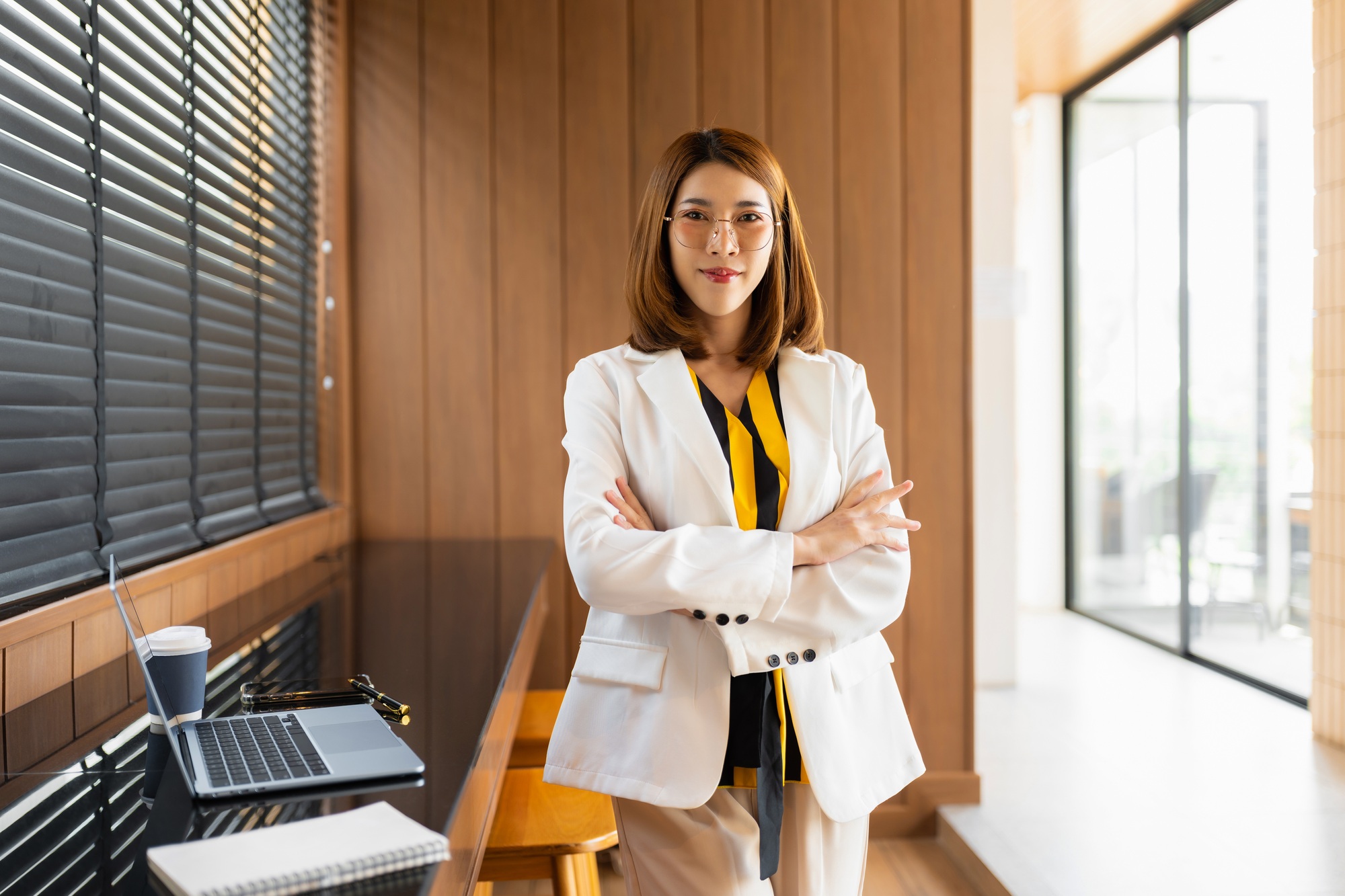 businesswoman portrait, Self confident young woman with crossed arms at office
