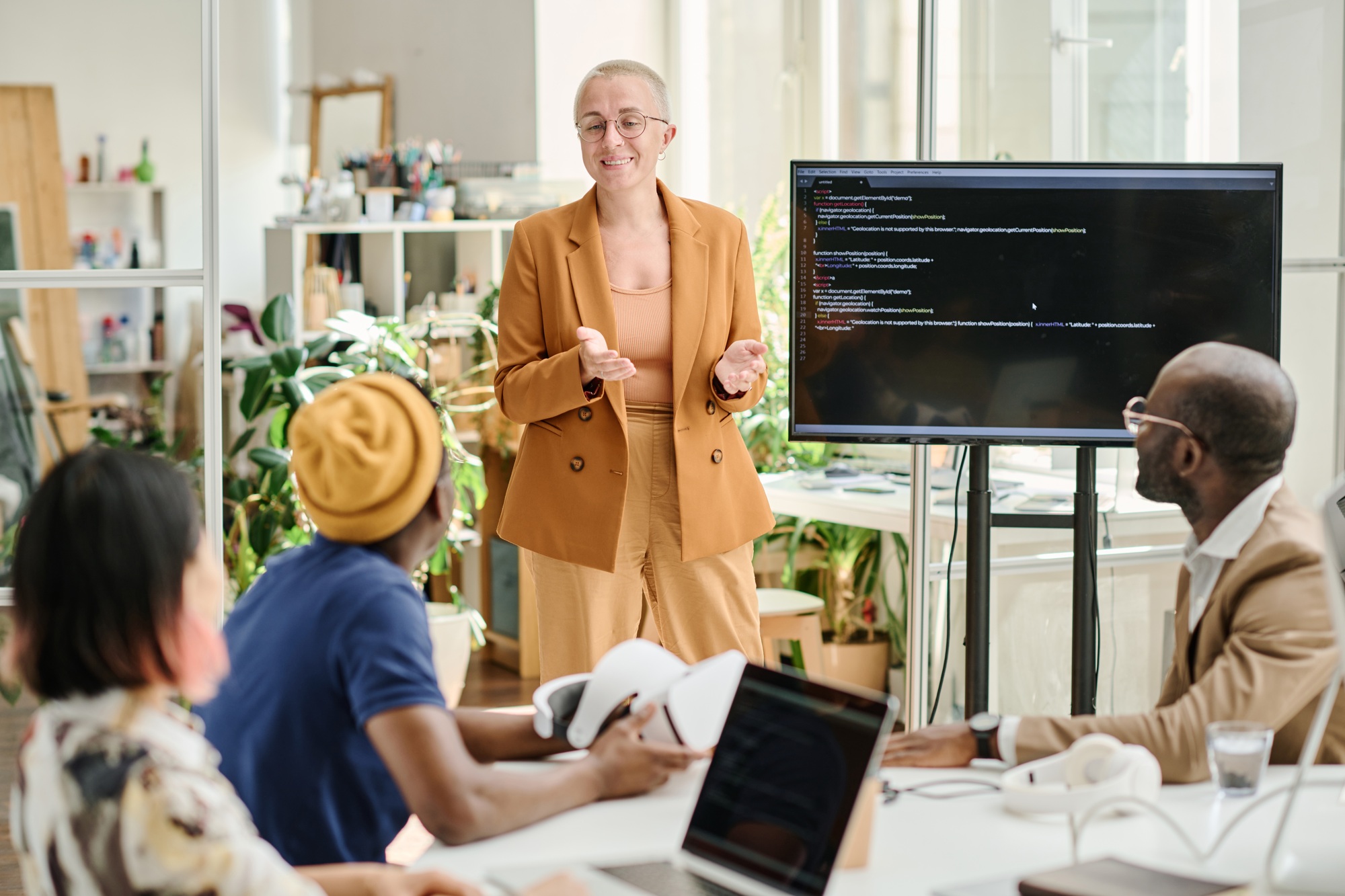 Businesswoman presenting new application for colleagues