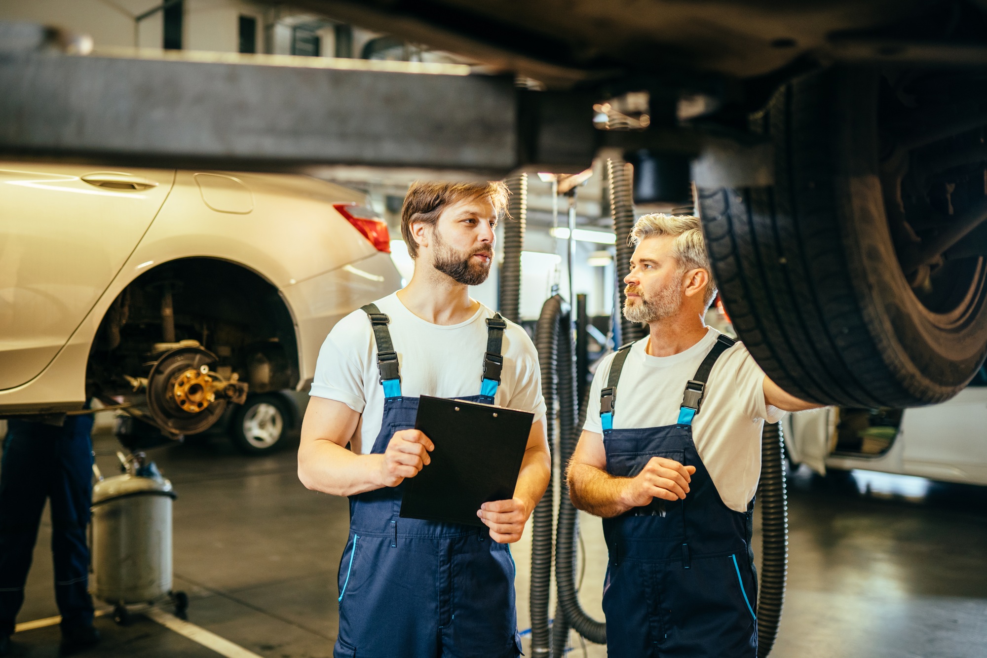 Car service, repair, maintenance and people concept.