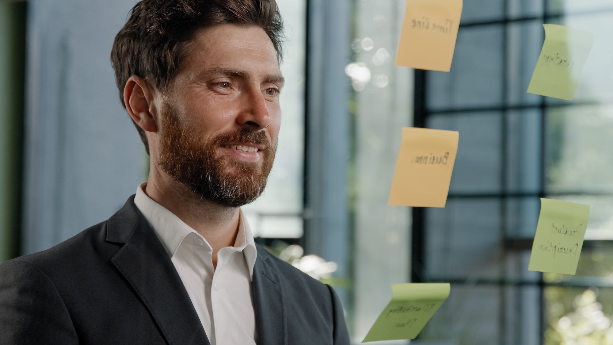 Close up 40s man busy with business strategy project management creative middle-aged businessman