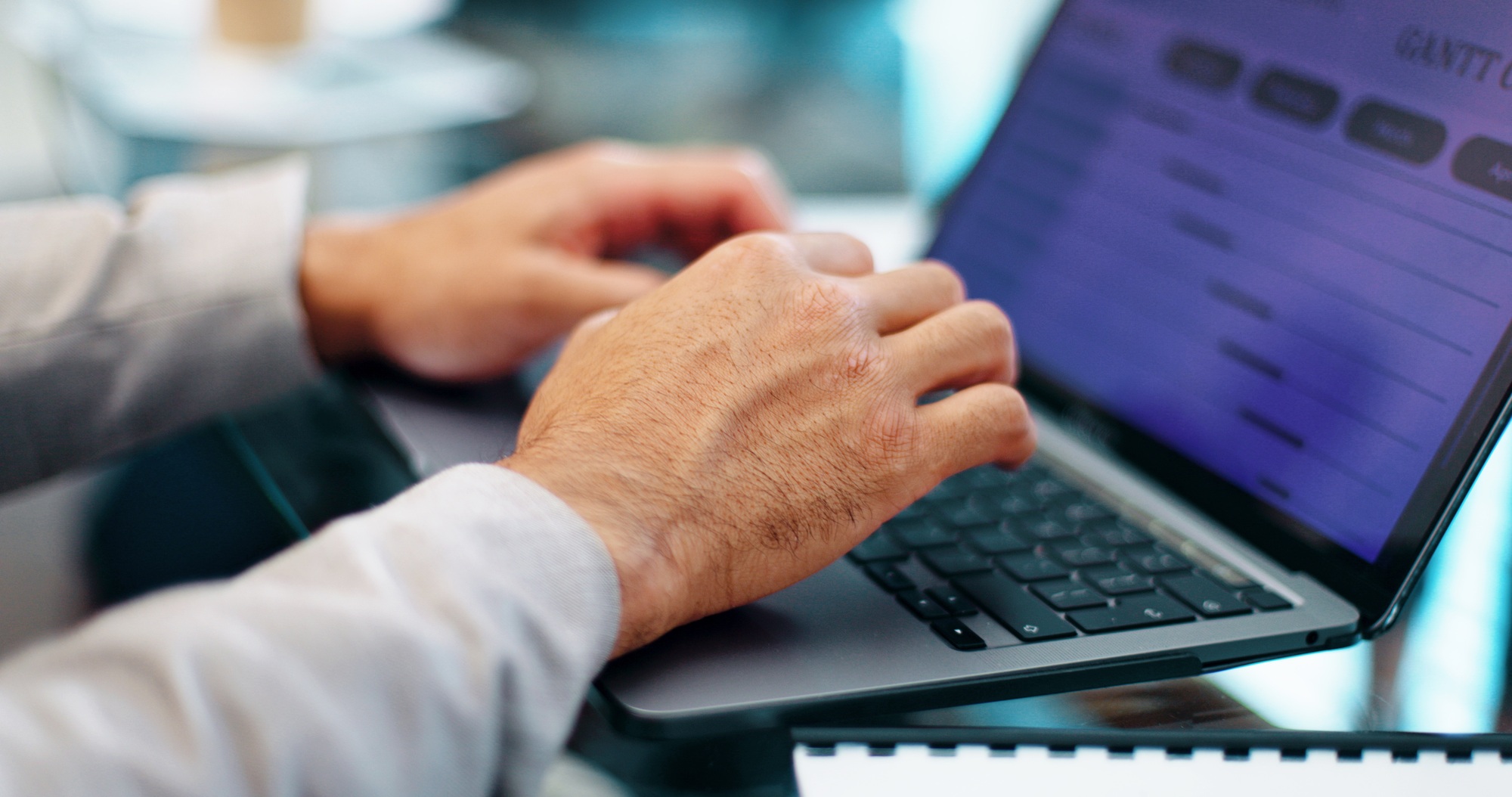 Closeup hands typing, laptop and businessman with schedule planning, calendar and goals for company