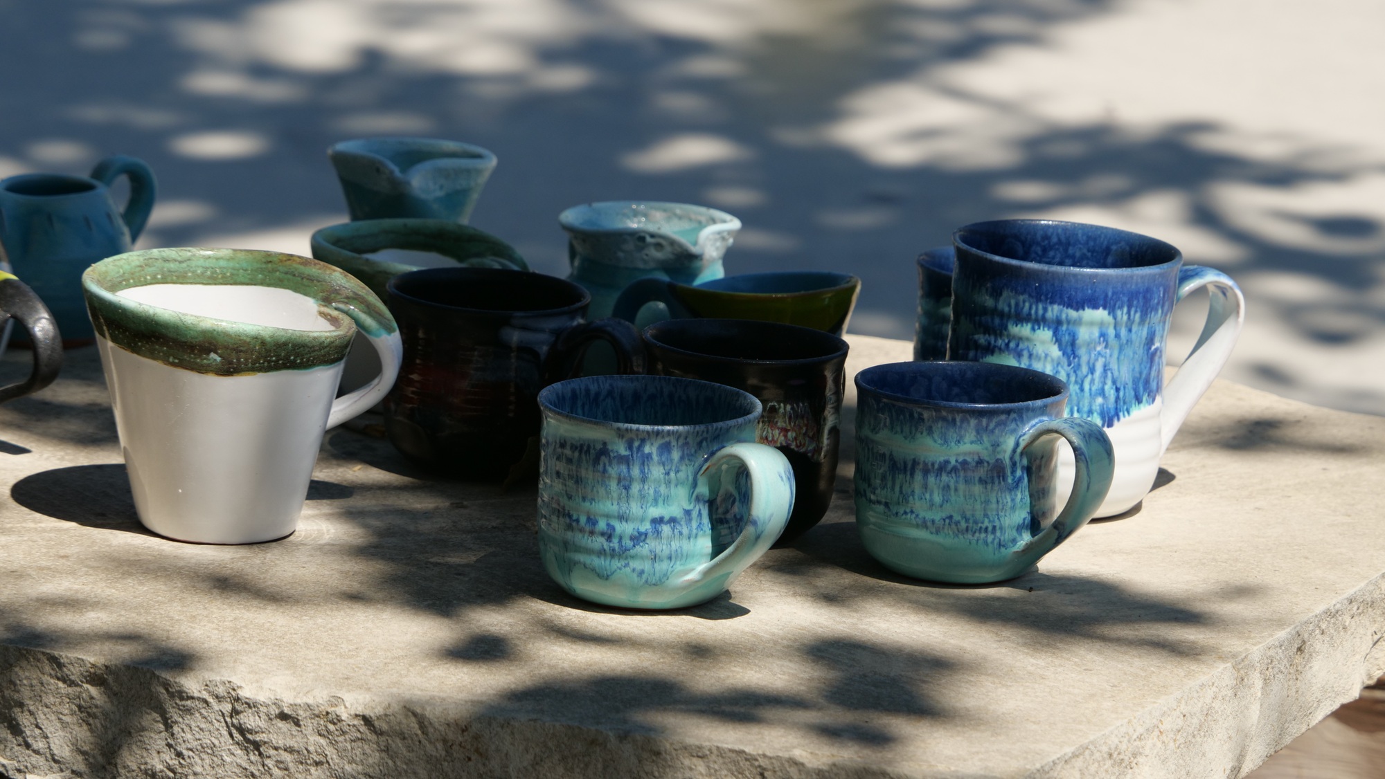 Closeup of handmade ceramic cups for sale