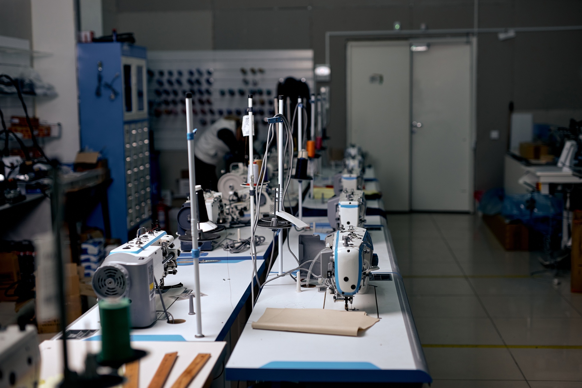 clothing manufacturing factory. sewing department, tailor's sewing room, no people