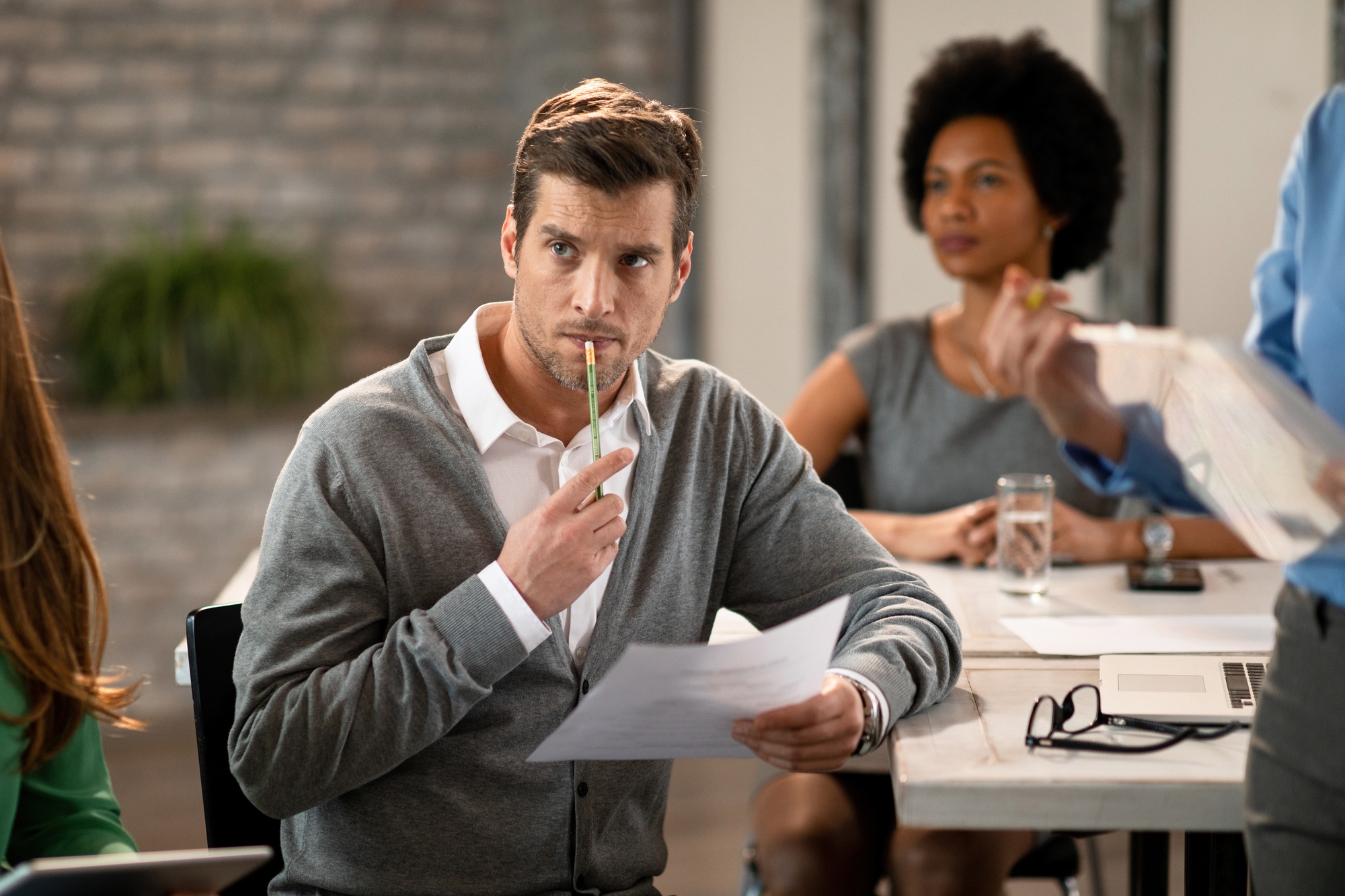 Concentrated businessman attending a training class in the office.