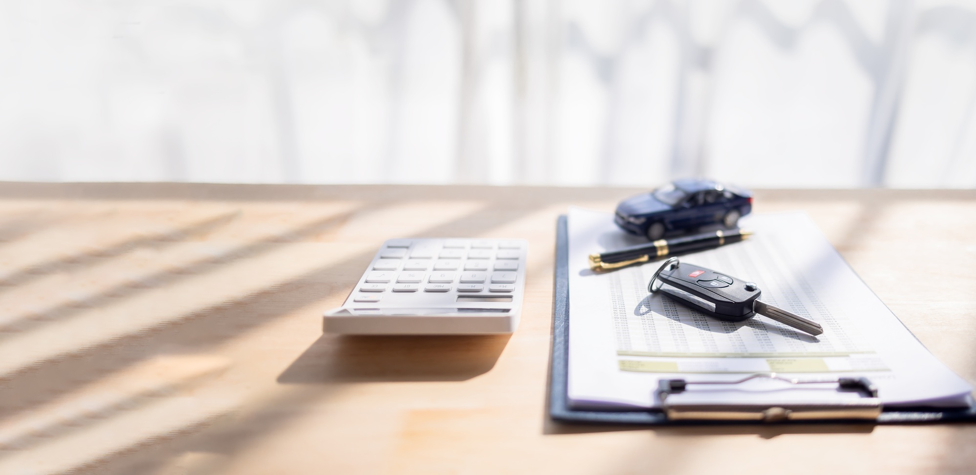Concept of car rental and Buying or selling Car Insurance document or lease, Sales contract, key,