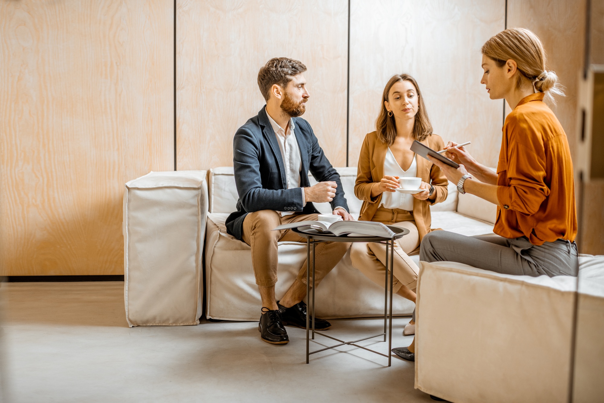 Couple at a reception at sales department or psychotherapist