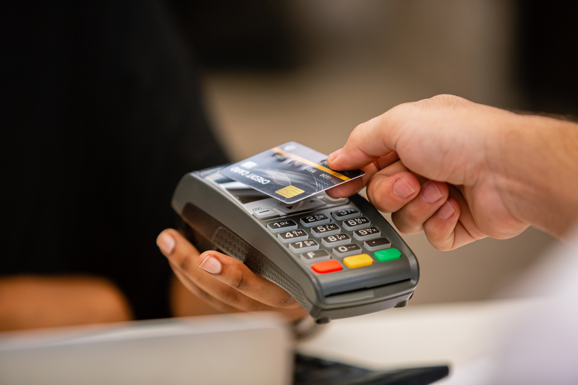 Credit card payment with POS terminal, Money payment shopping online in store.