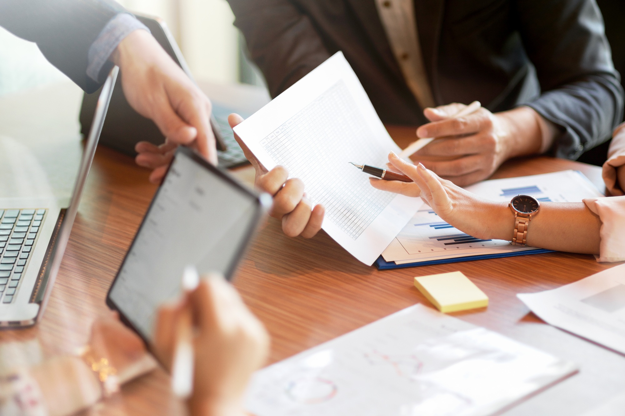Cropped image of a professional business team working together
