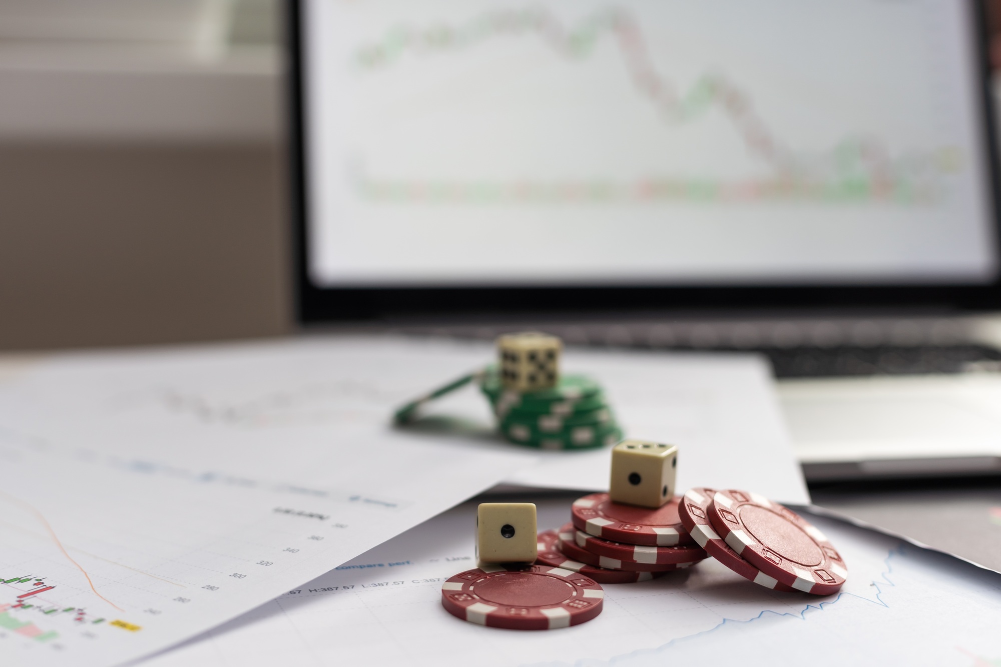 Dices cubes to trader. Cubes with the words SELL BUY on financial chart as background. Selective