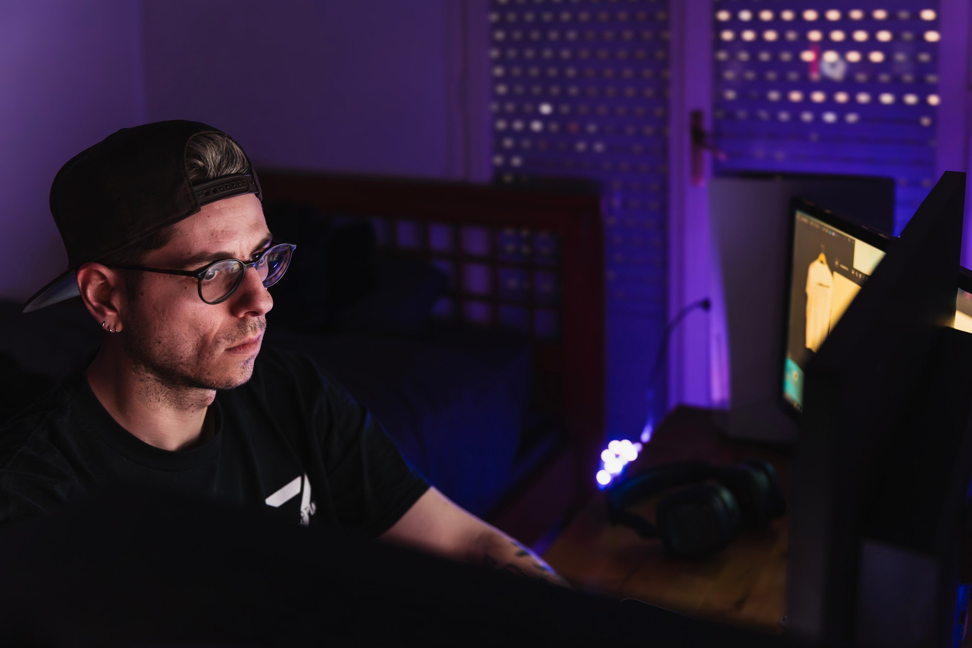 Digital creator working on the computer with his personal brand