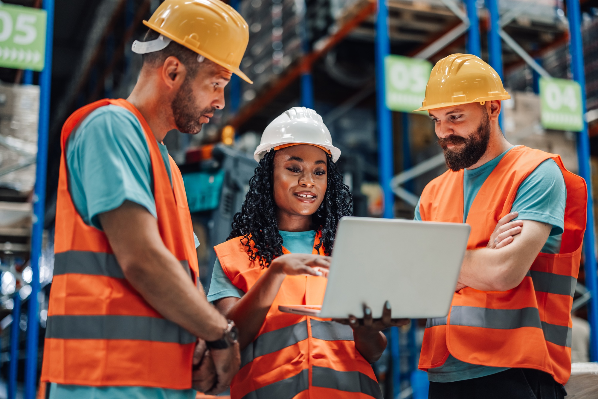 Diverse professionals involved in logistics planning using technology