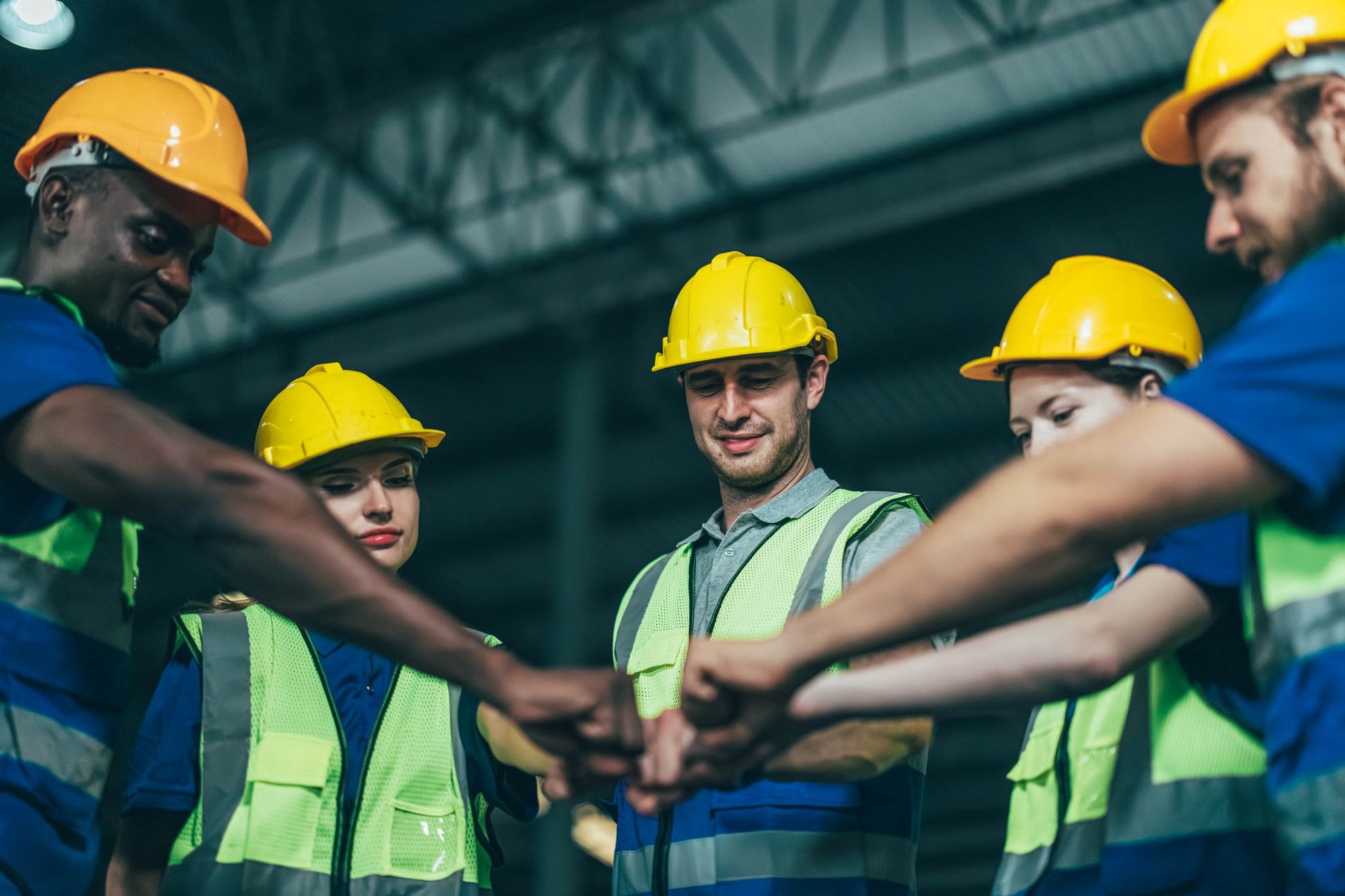 Diverse warehouse team create empowerment, confidence. Collaboration drives excellence in logistics