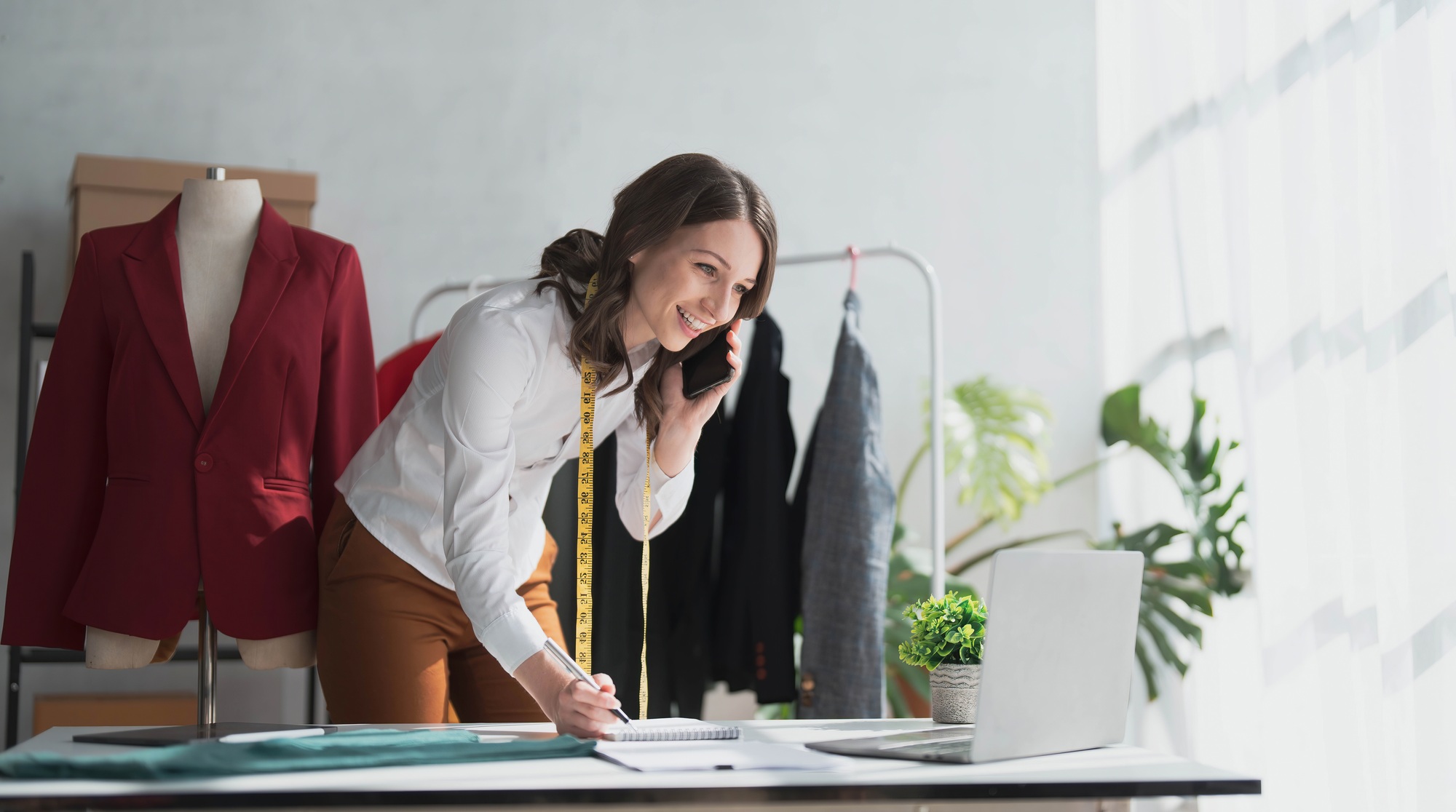 Ecommerce, small business and phone call, woman with tablet taking sales orders and checking