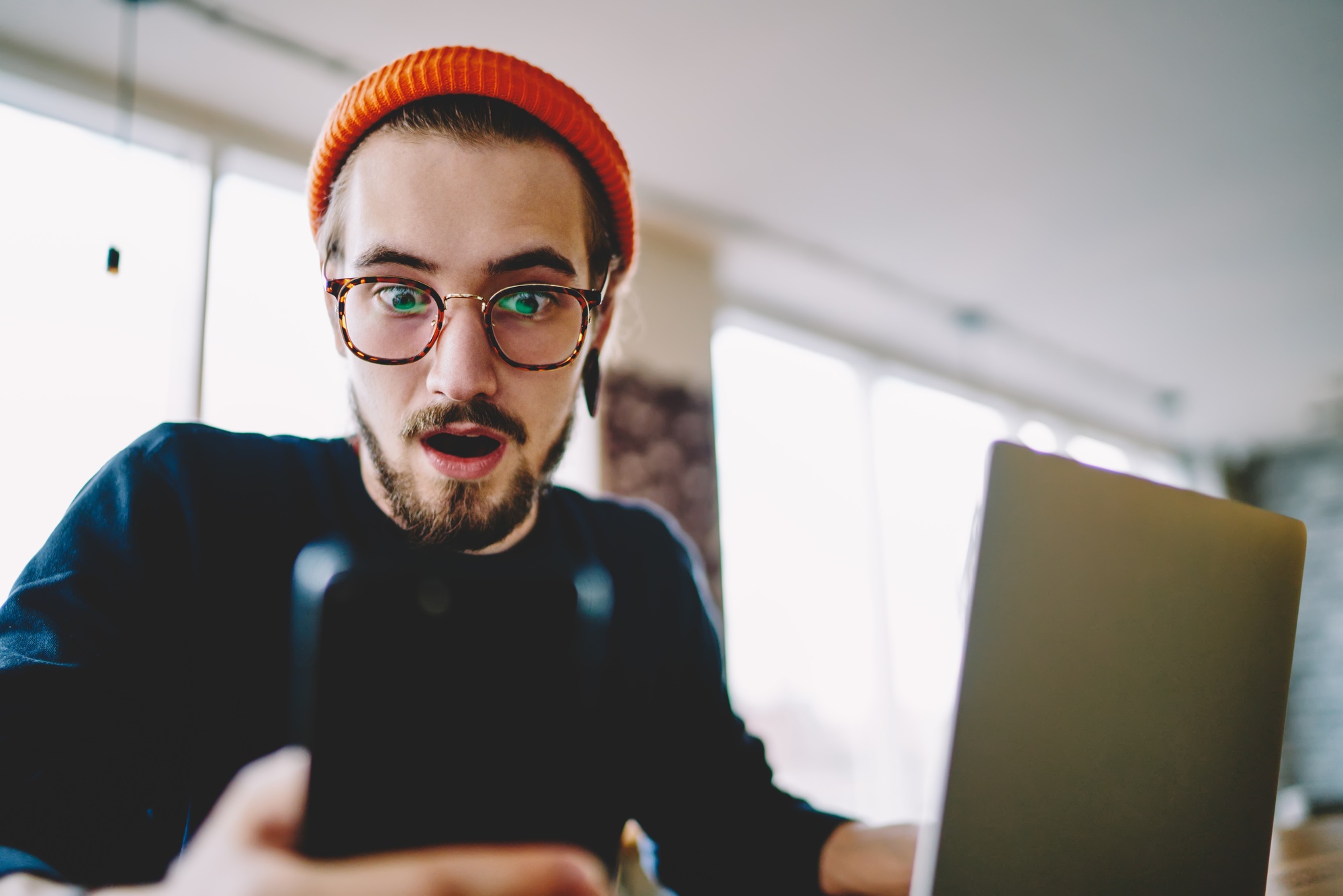 emotional male can't believe in sales and discount for digital devices in web store