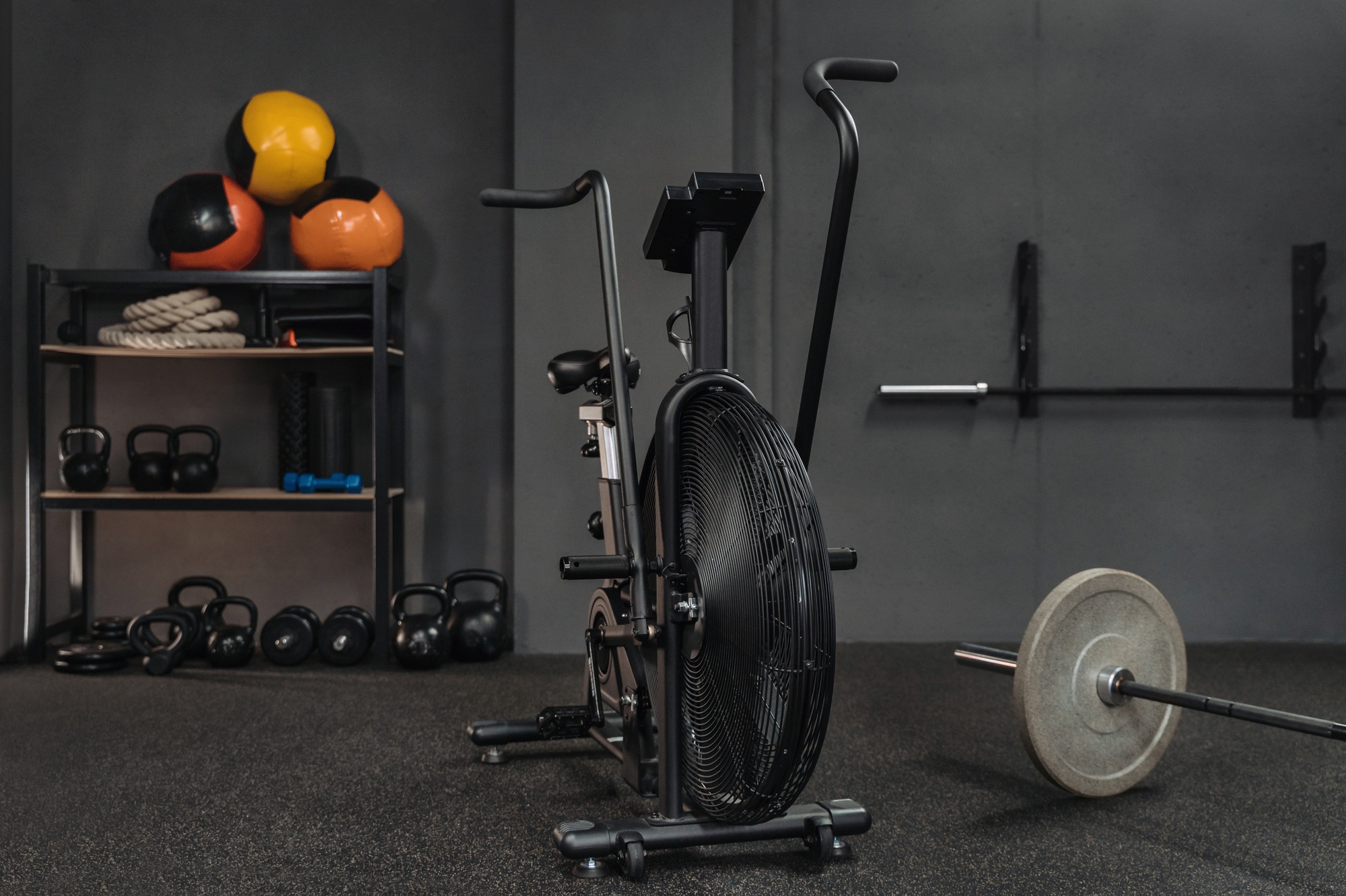 Empty crossfit gym with sports equipment. Workout, bodybuilding and fitness content