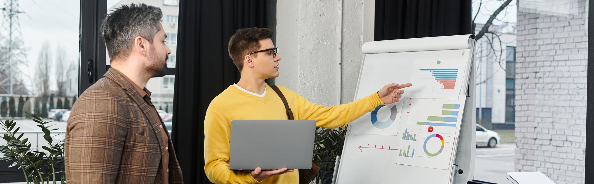 Engaging onboarding session in a modern office with dynamic discussion and visual presentation