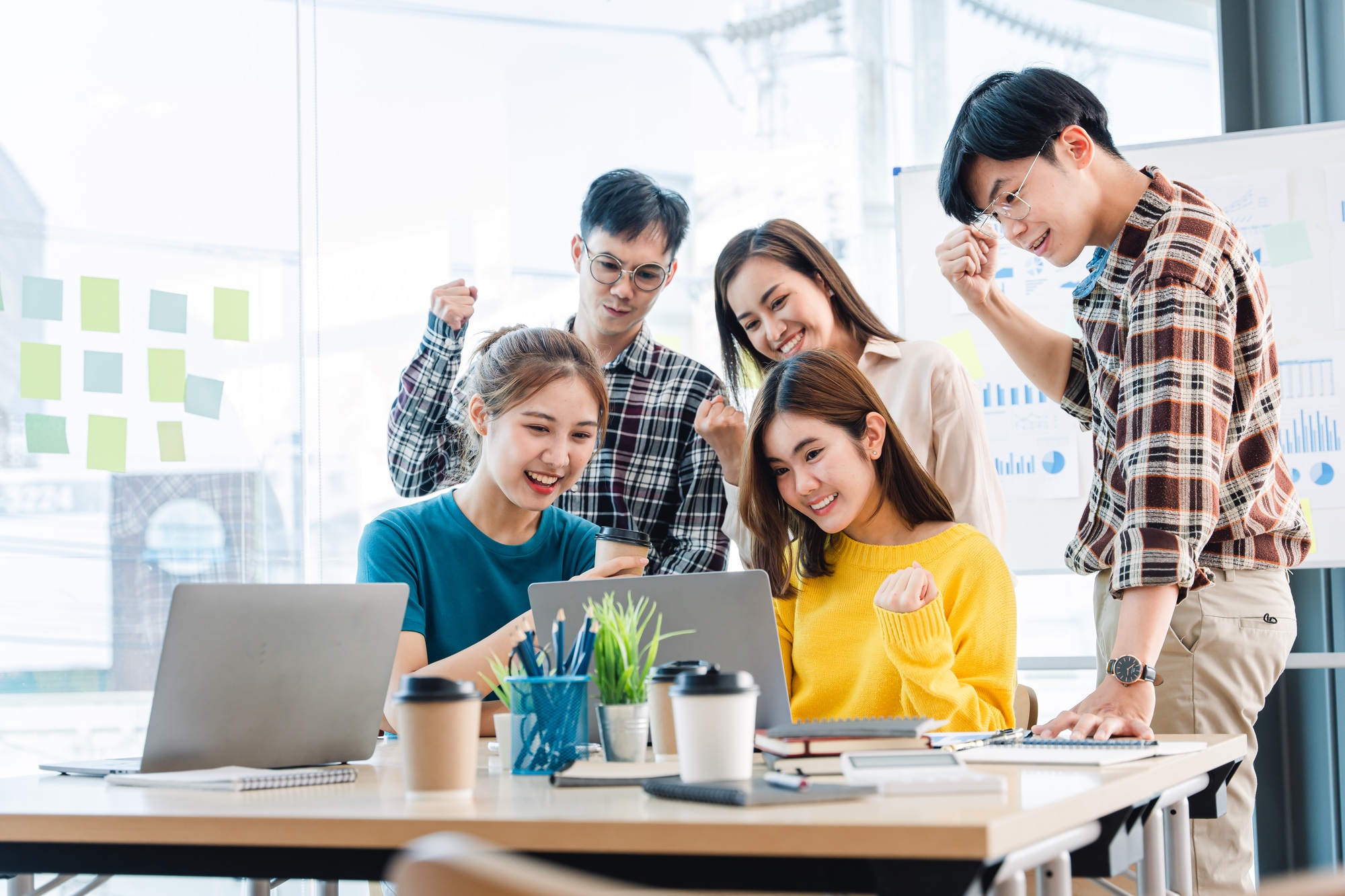 Excited entrepreneurs are successful and business people achieve goals.