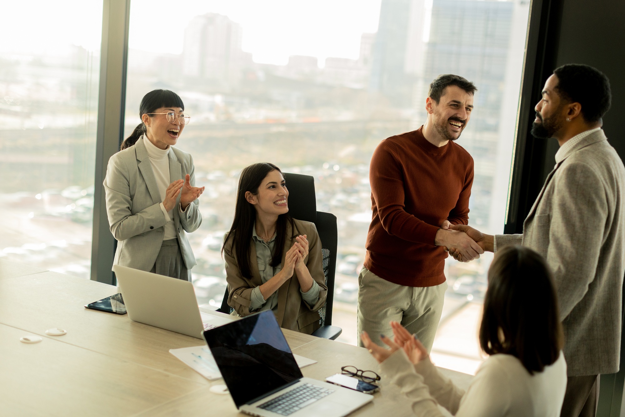 Exciting moments of success in a modern office setting filled with celebration and teamwork