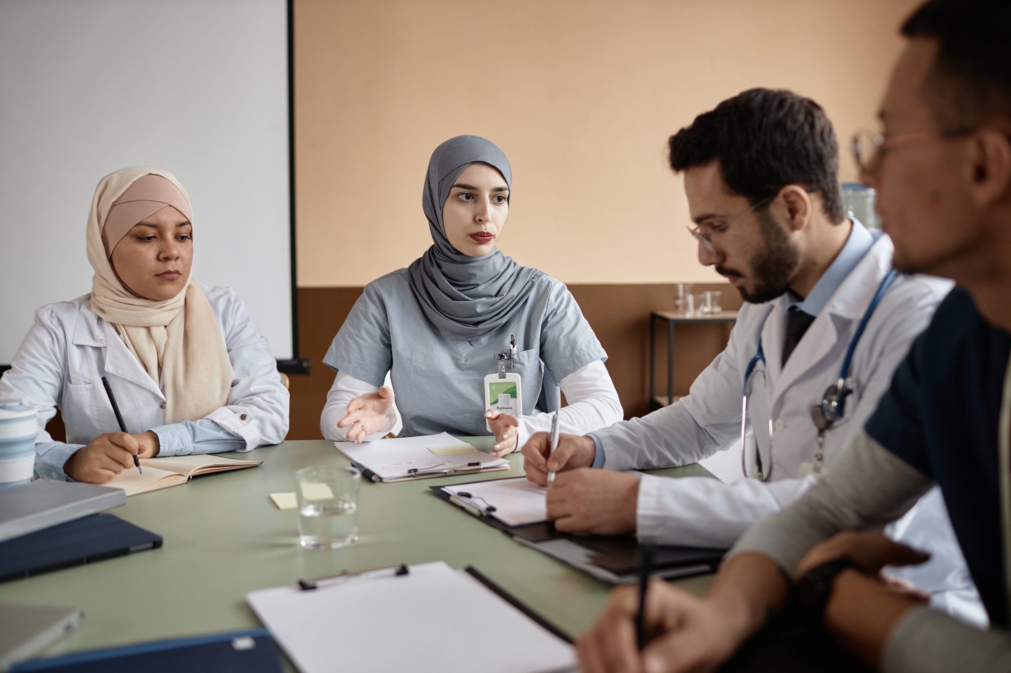 Female Medical Specialist Delivering Staff Training