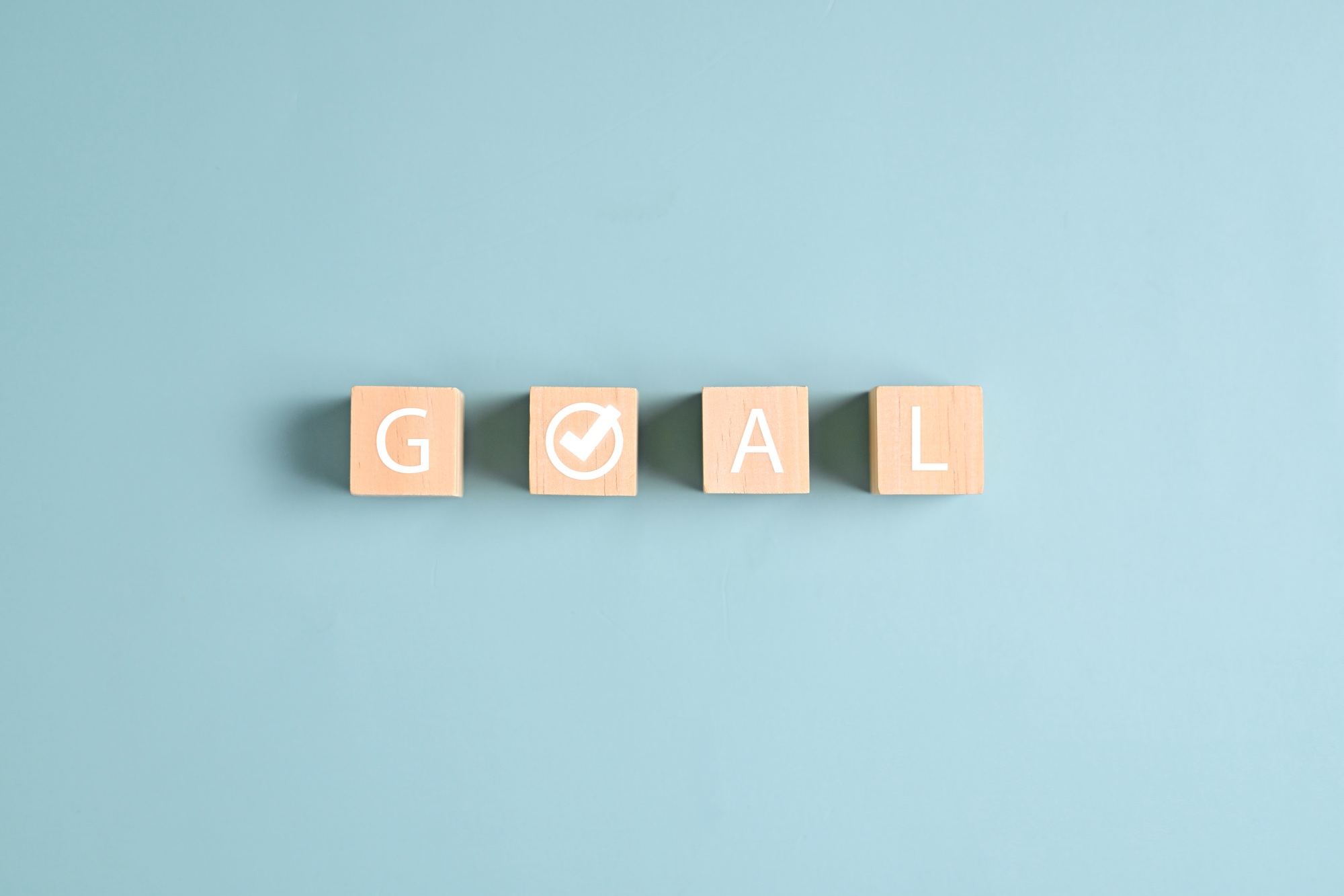 Goal word on wooden blocks for business goal an strategy planning management, Business financial