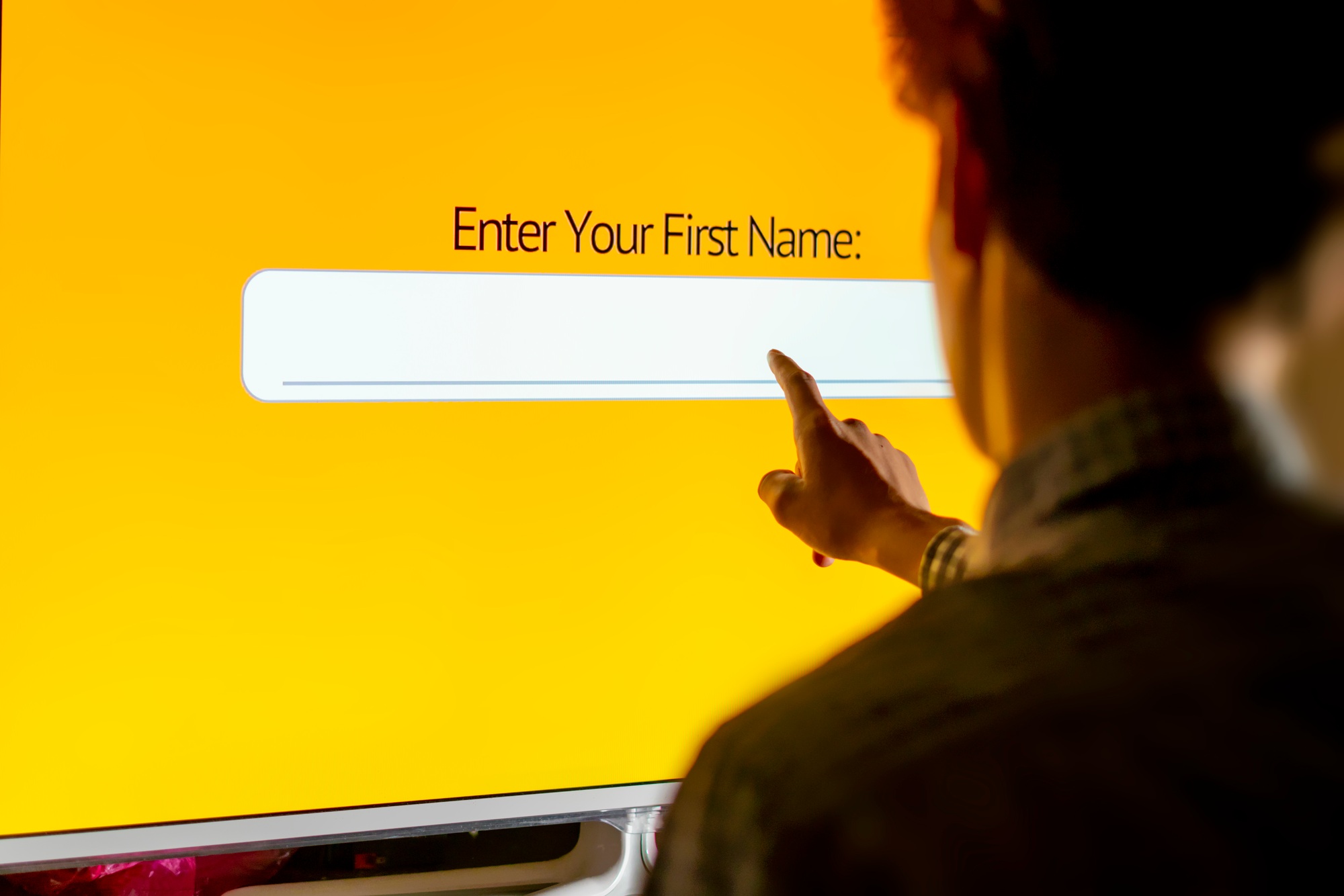 hand enter the name on a touch panel screen d