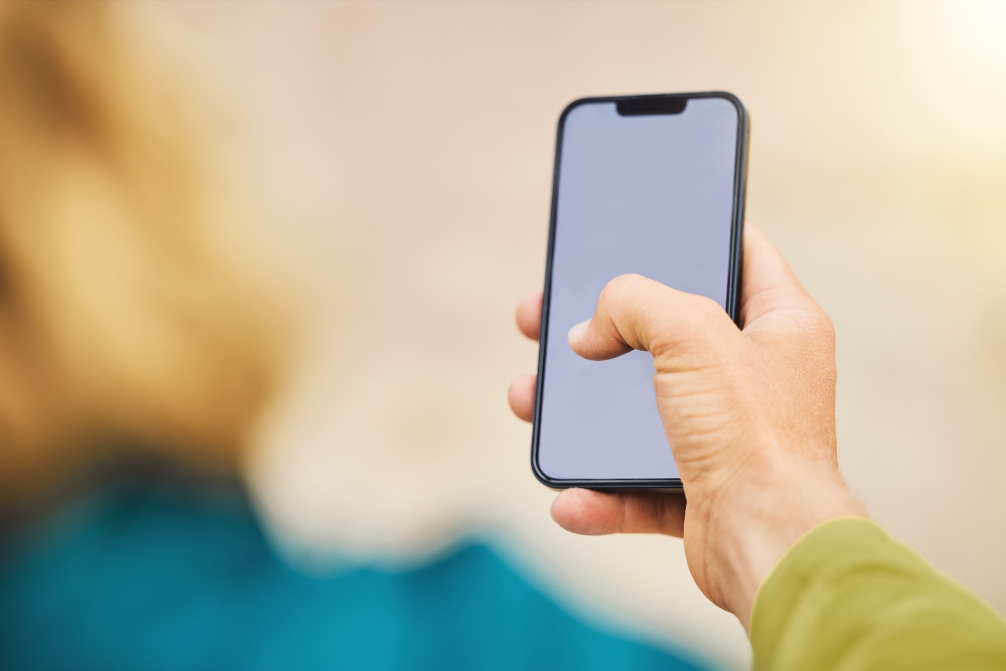 Hand, phone and mockup for social media, advertising or marketing in texting, chatting or communica
