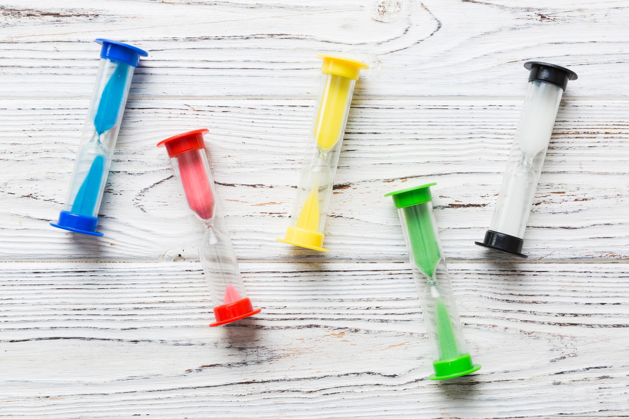 hourglass on the table, sand clock as time passing concept for business deadline, copy space