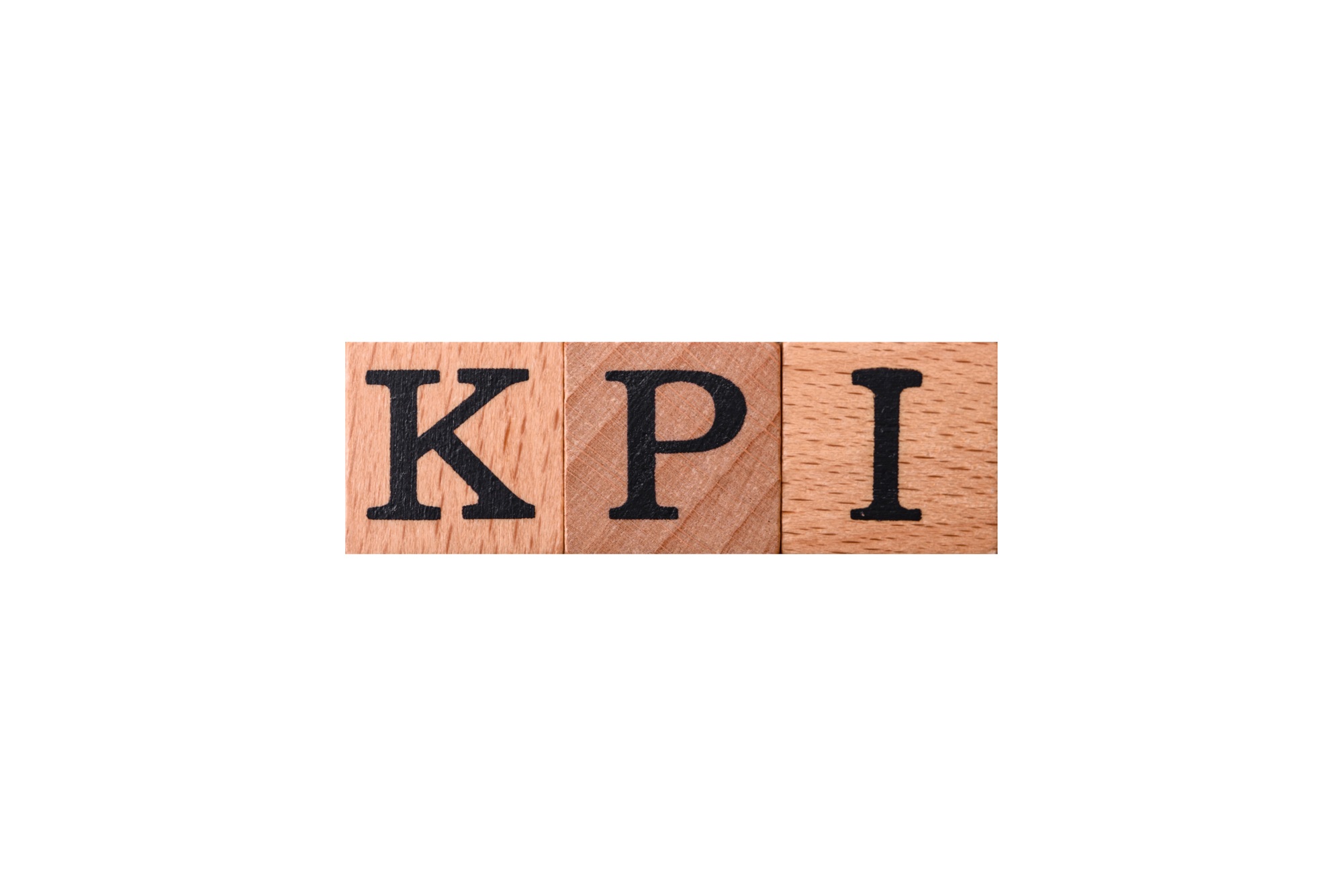 Inscription KPI Key Performance Indicator with wooden cubes