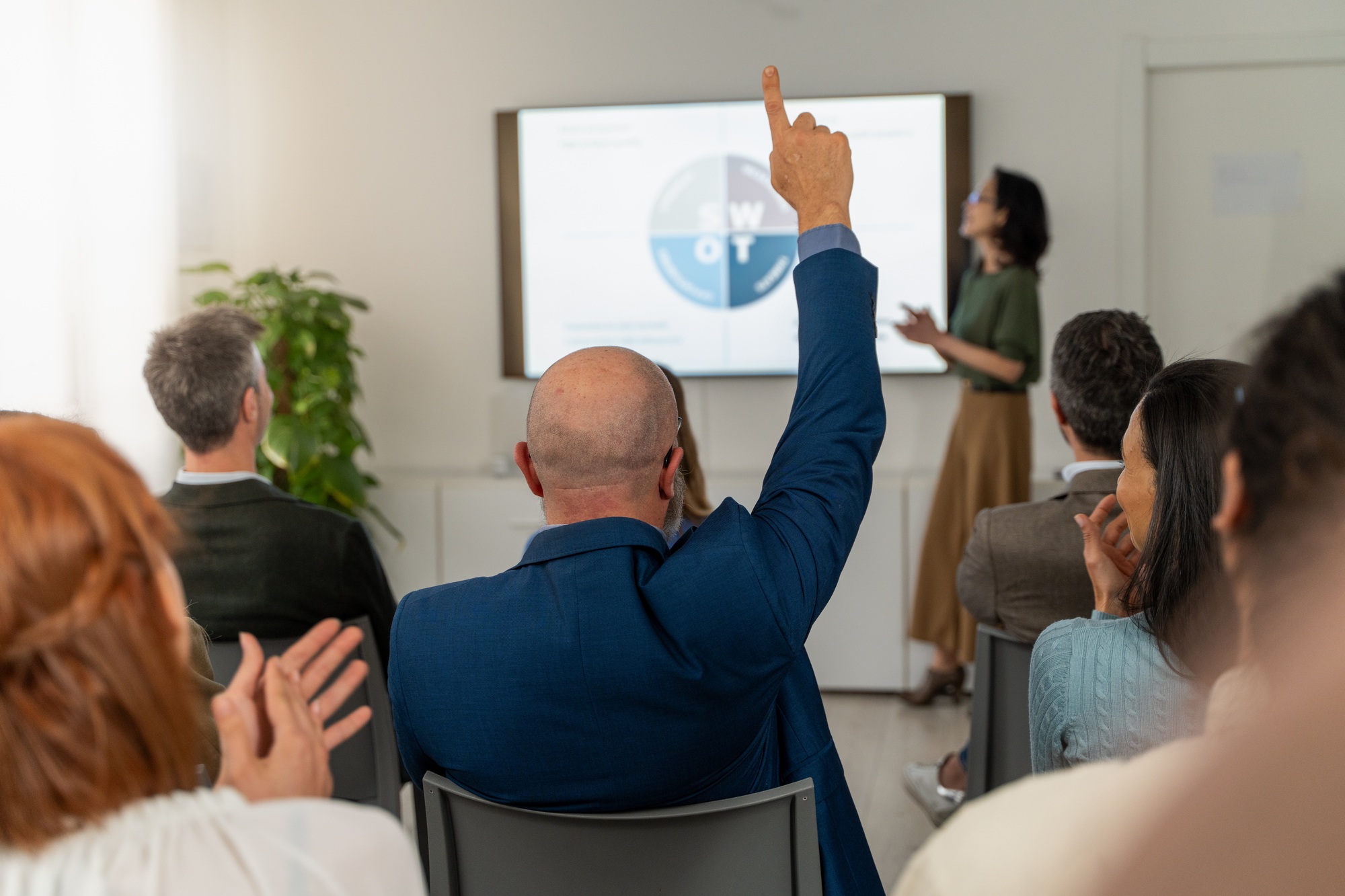 Interactive SWOT analysis presentation diverse business team engagement question answering