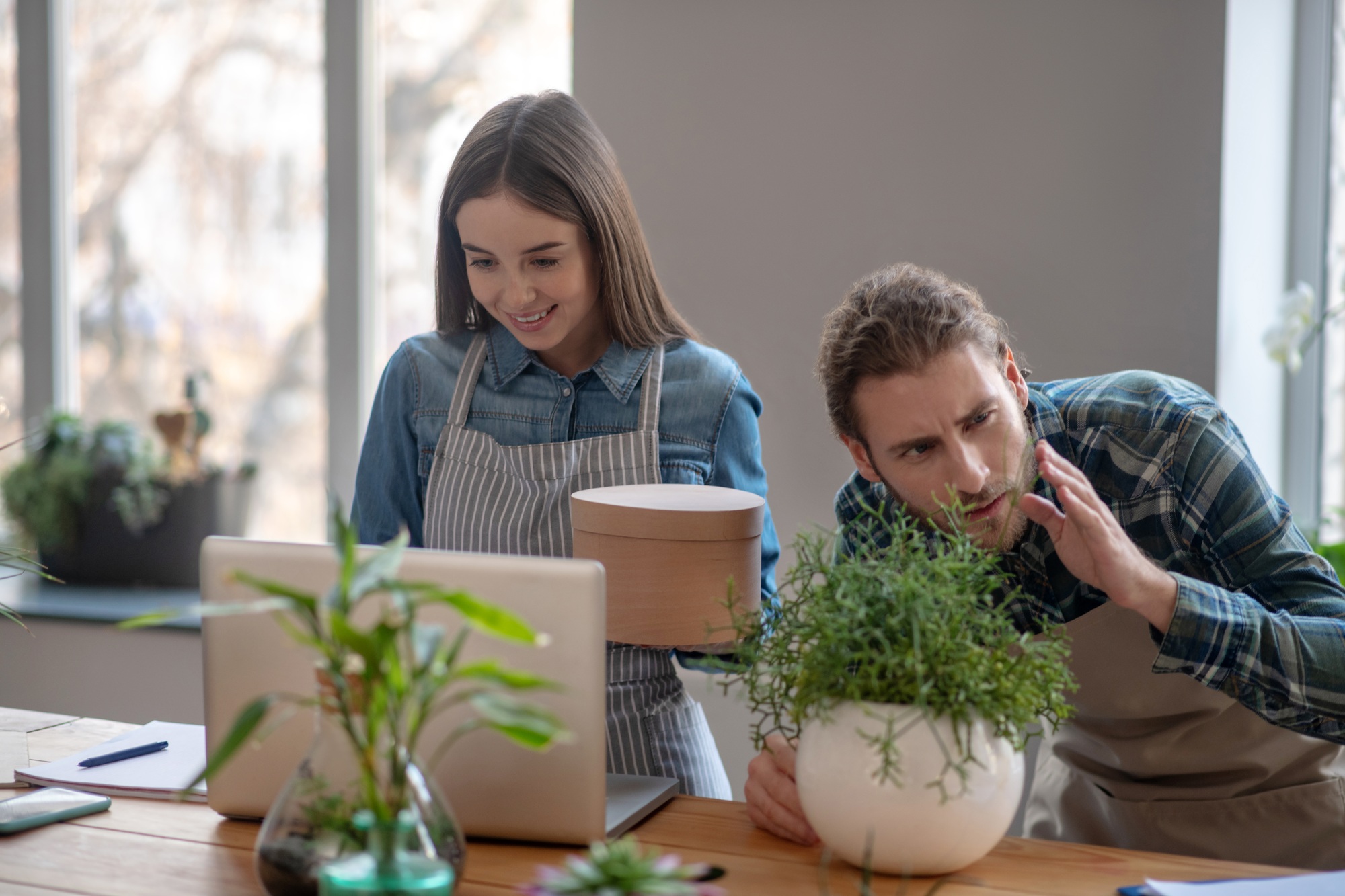 Man and a woman running an online plant store
