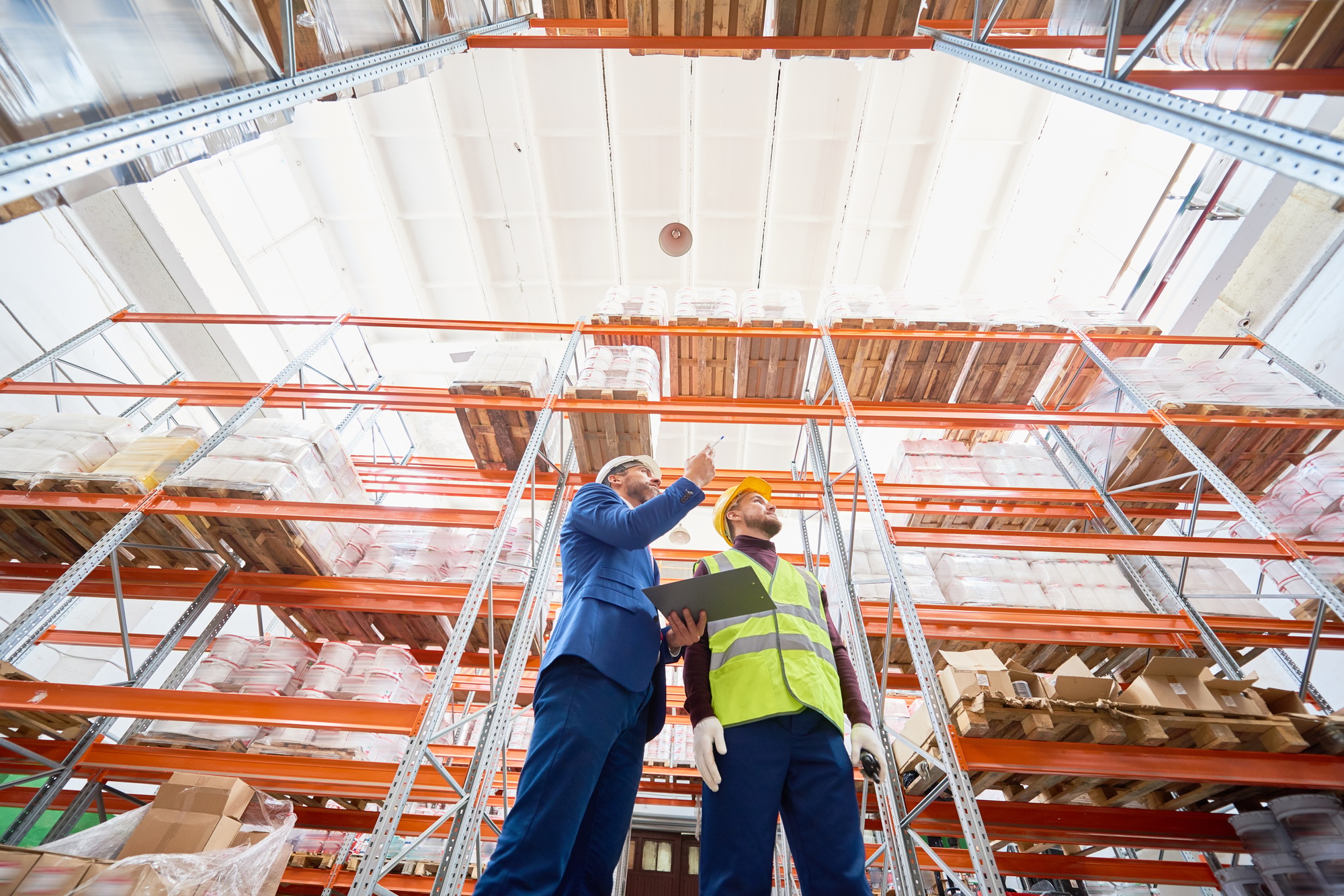 Manager Doing Inventory in Warehouse