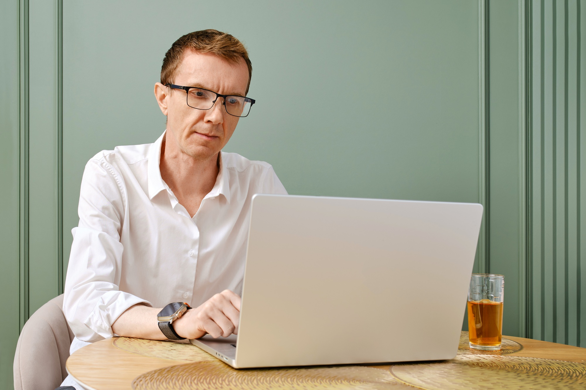 Middle aged entrepreneur owner of small business working online