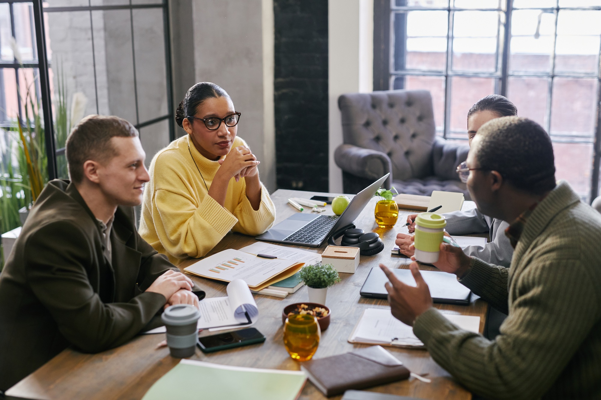 Multiethnic Young Adult Business Professionals Engaging in Strategic Planning