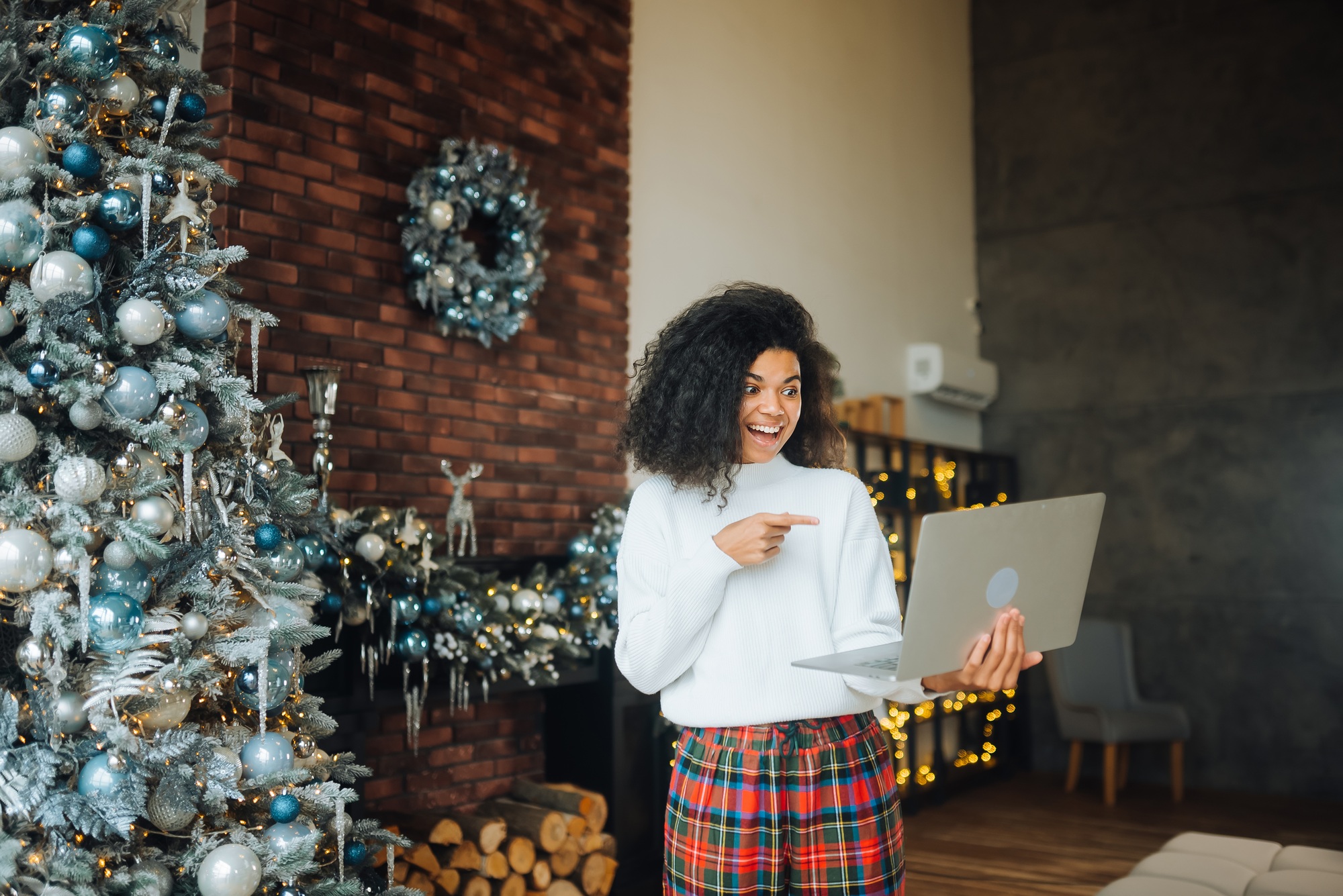 Nice attractive lovely woman holding in hands laptop, goal achievement