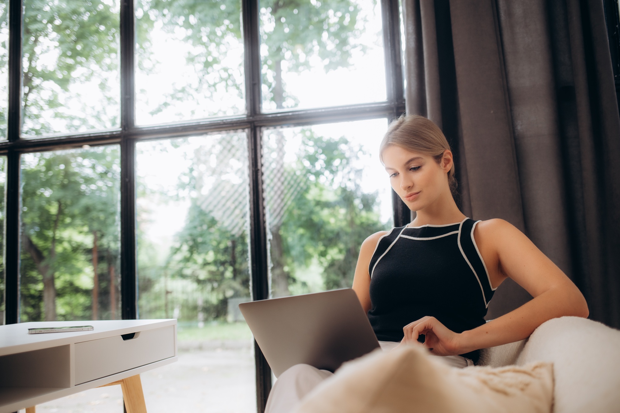 Office Work. Successful Middle-Aged Businesswoman Using Laptop Computer Sitting At Workplace Indoor.