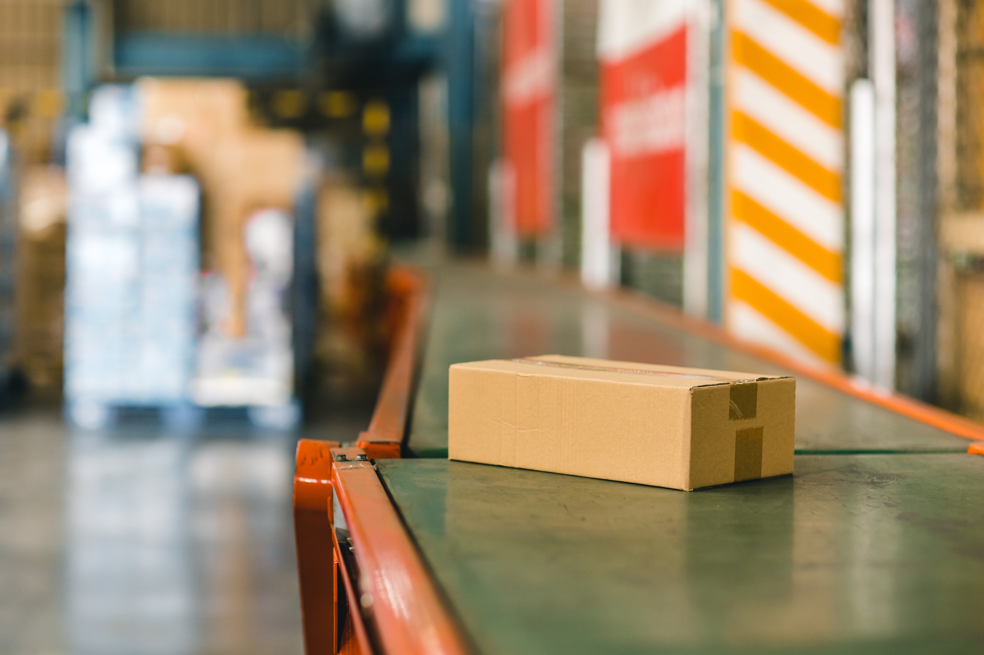 parcel box on conveyor belt products goods delivery shipping from warehouse inventory