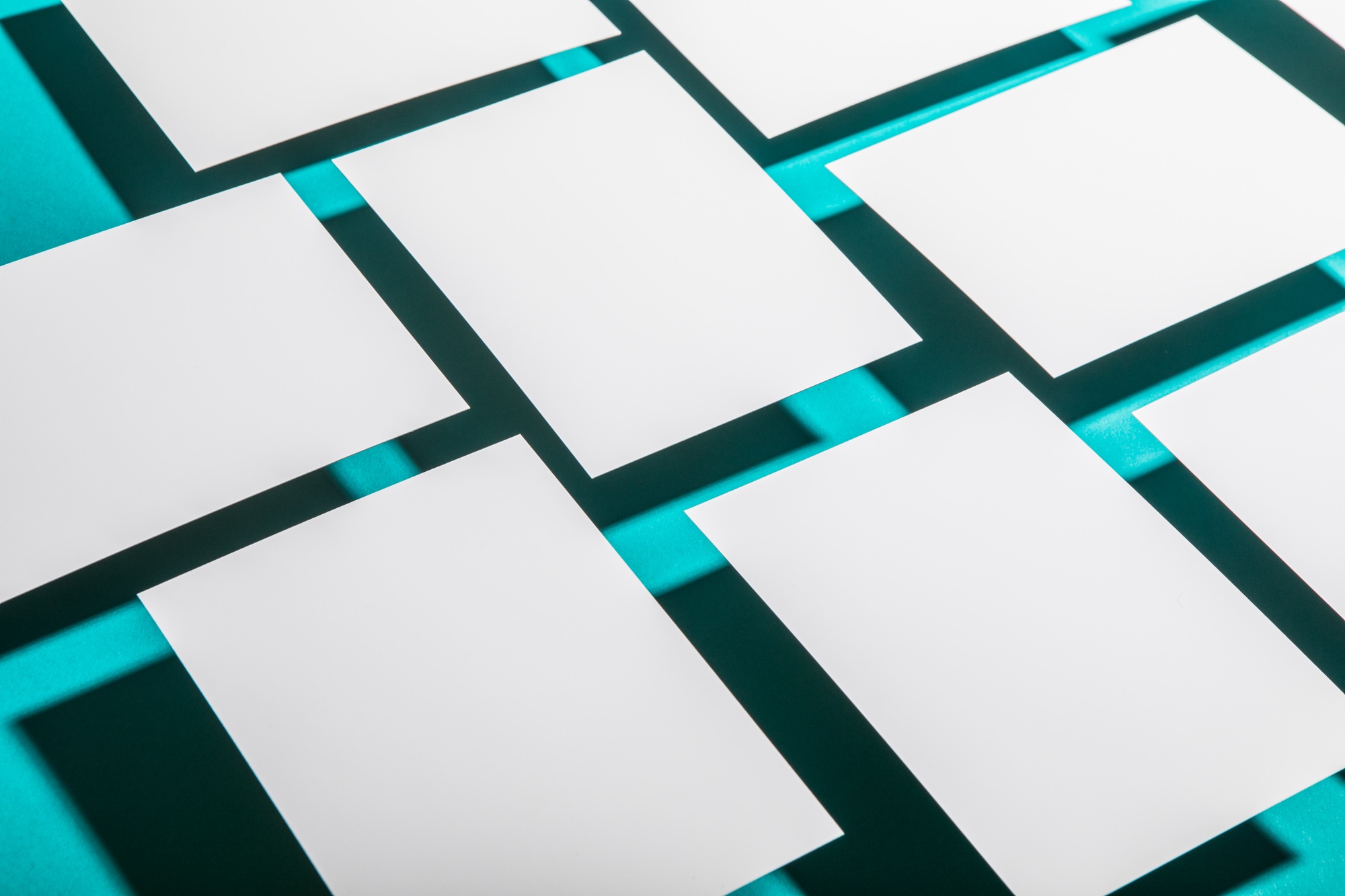 Pattern of realistic floating business branding cards template mockup with shadows.