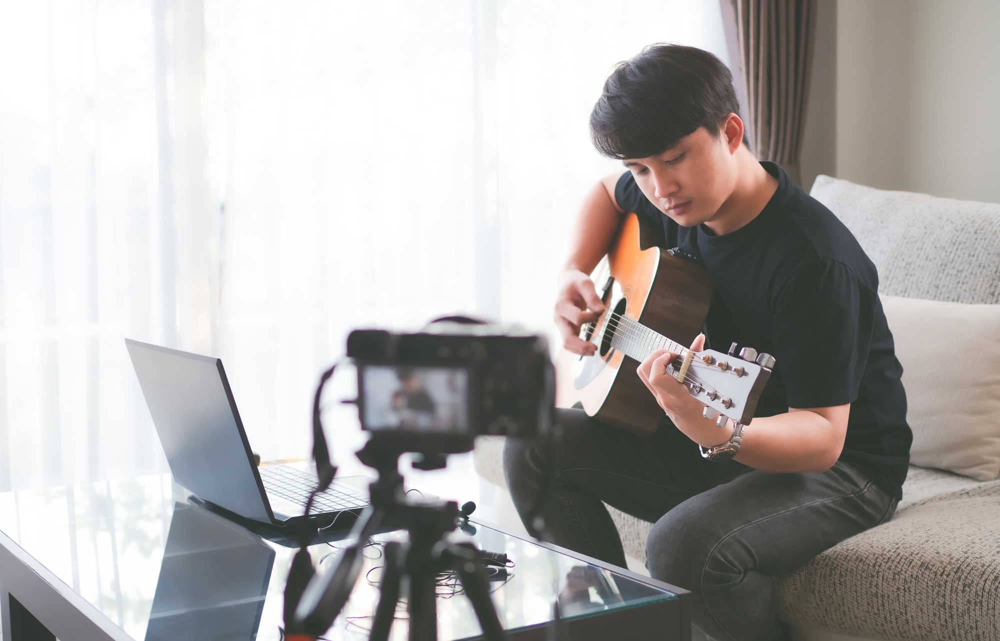 People use technology for live training guitar and shaw live online in new normal concept