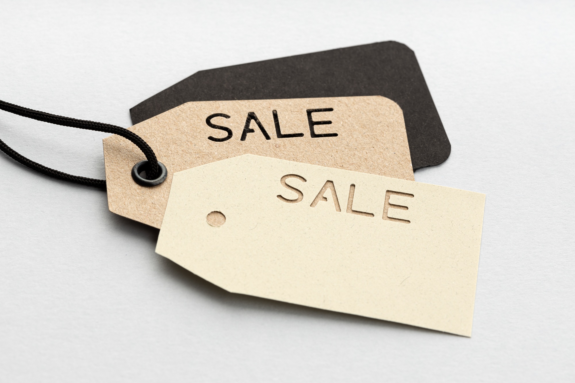 Price tags with die cut SALE text