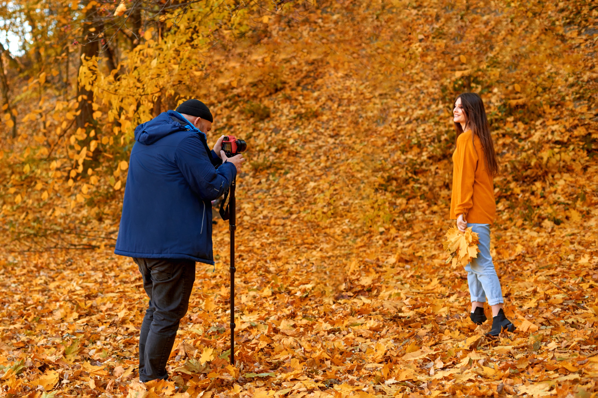 professional video shooting for vlog or blog on YouTube and social networks in fall park